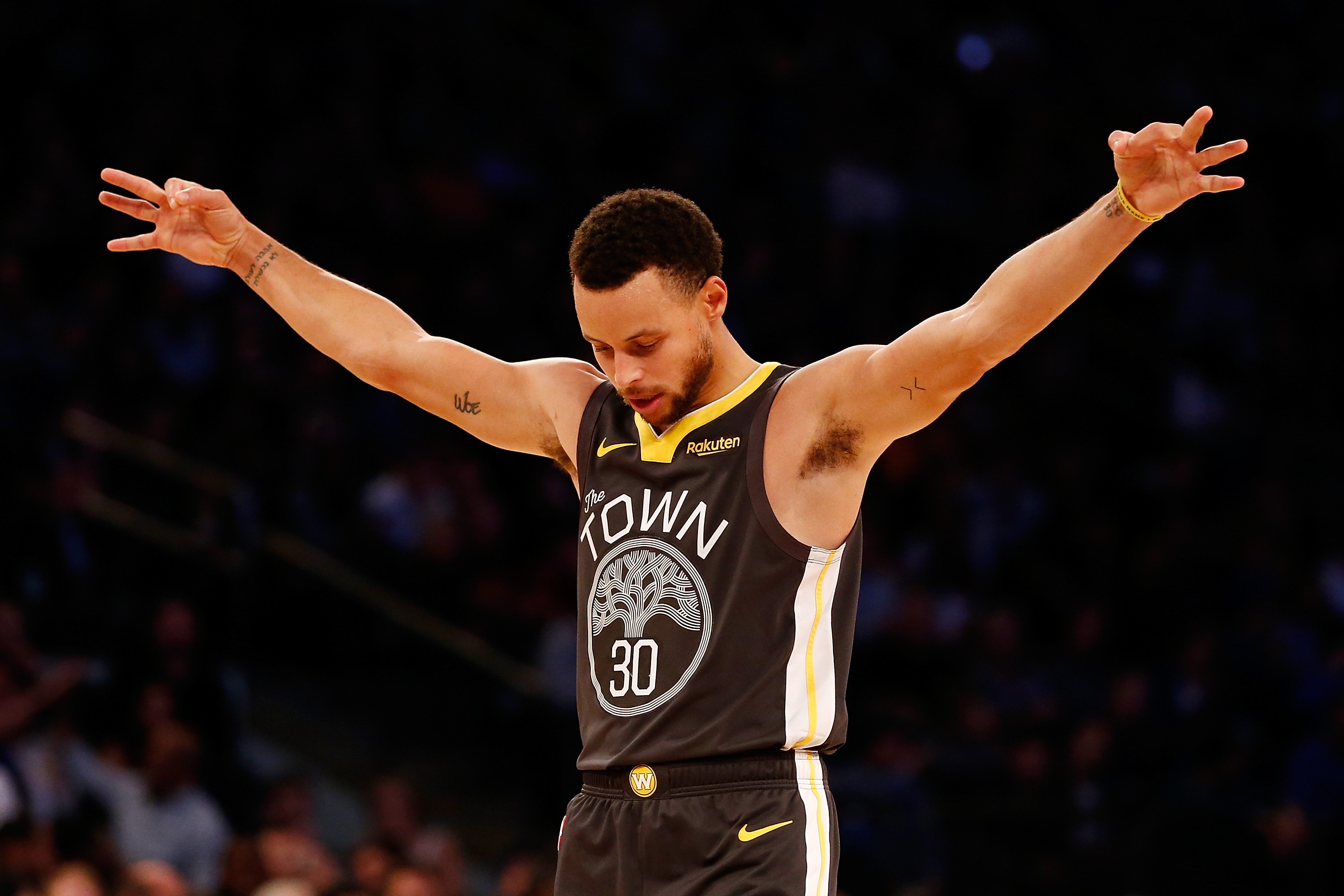 Stephen Curry celebrating after a win against the New York Knicks