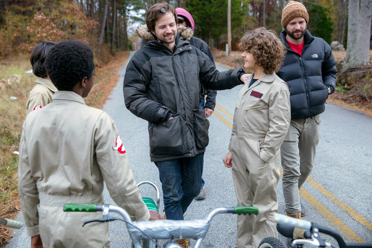 Caleb McLaughlin (from left), Matt Duffer, Gaten Matarazzo, and Ross Duffer film 'Stranger Things' Season 2. The Duffer Brothers teased a 'Lord of the Rings' like, epically long series finale in season 5.