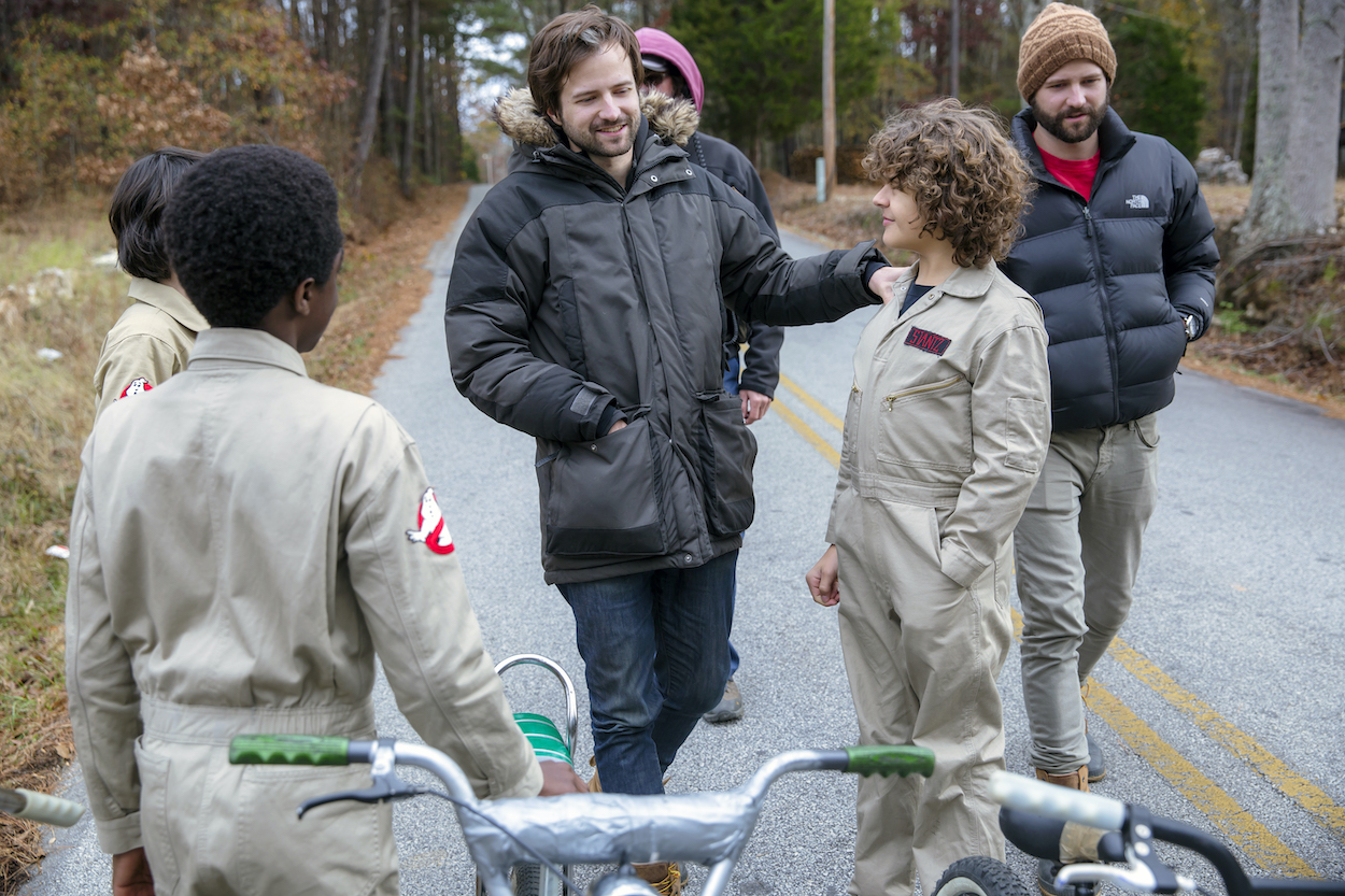 Caleb McLaughlin (from left), Matt Duffer, Gaten Matarazzo, and Ross Duffer film 'Stranger Things' Season 2. The Duffer Brothers teased a 'Lord of the Rings' like, epically long series finale in season 5.