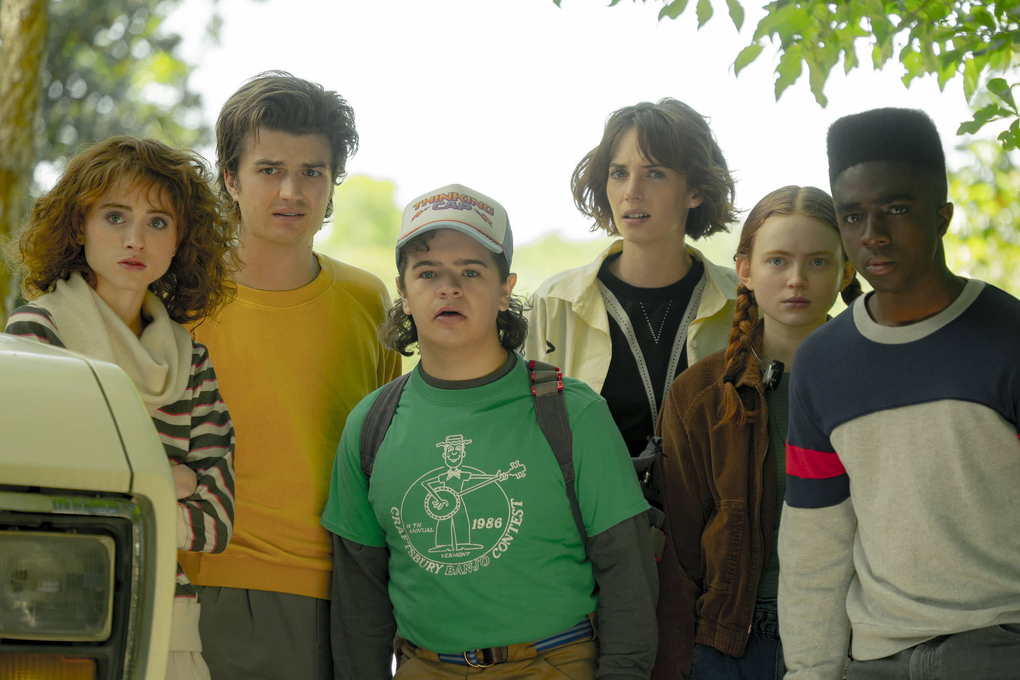 A production still from 'Stranger Things' Season 4 featuring Natalia Dyer as Nancy Wheeler, Joe Keery as Steve Harrington, Gaten Matarazzo as Dustin Henderson, Maya Hawke as Robin Buckley, Sadie Sink as Max Mayfield, and Caleb McLaughlin as Lucas Sinclair. Season 4 set up a few stories for 'Stranger Things' Season 5.