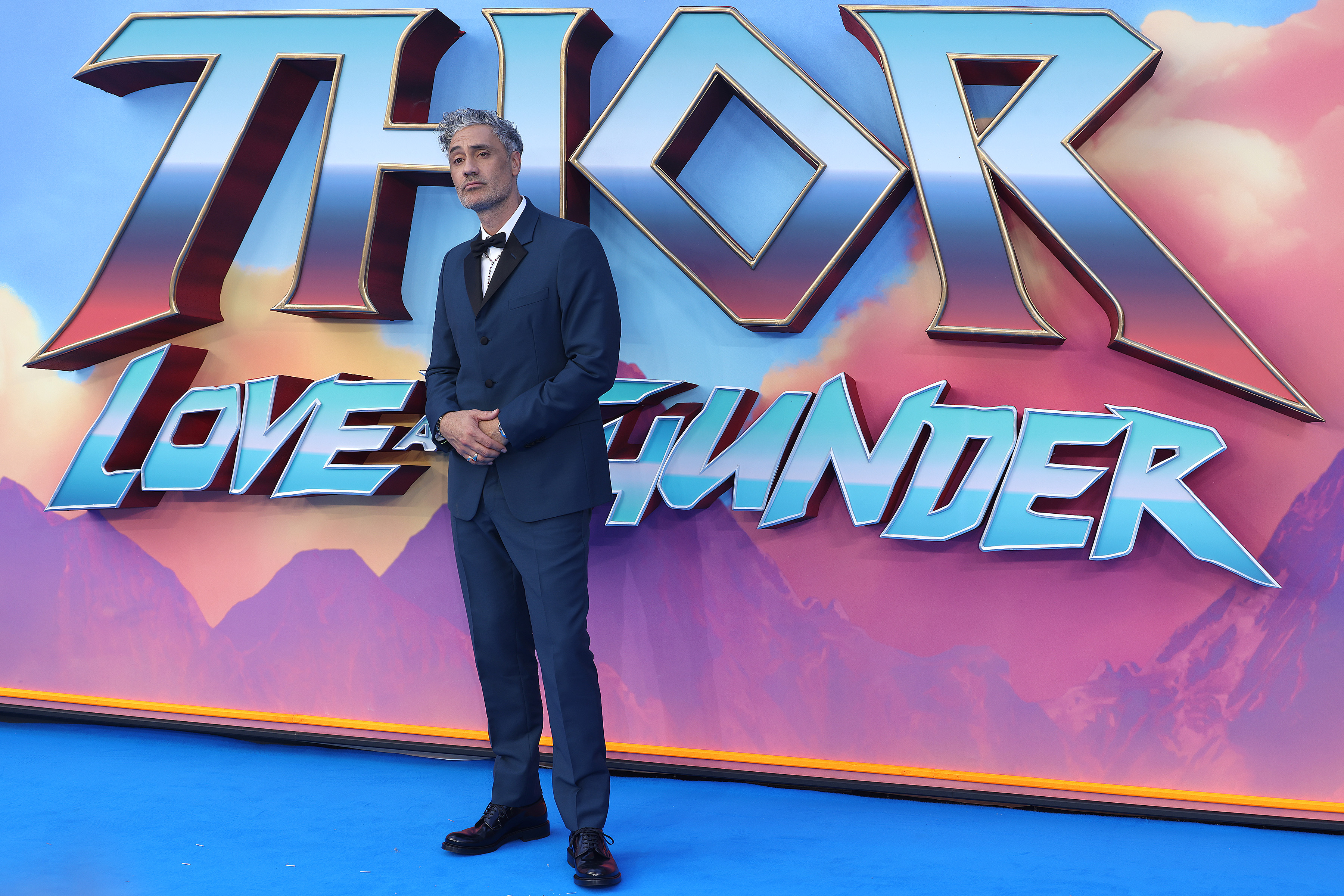 Taika Waititi attends a UK gala screening for Thor: Love and Thunder, which also features the Guardians of the Galaxy