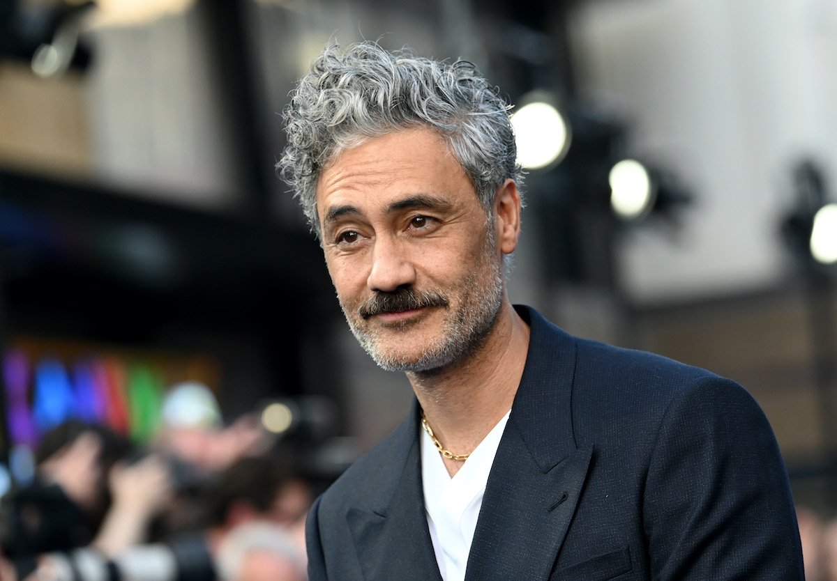 Taika Waititi slightly smiling