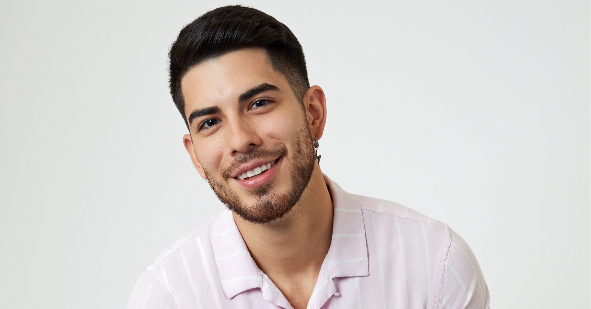 'The Bachelorette' stars Alec Garza, seen here wearing a light pink button down.