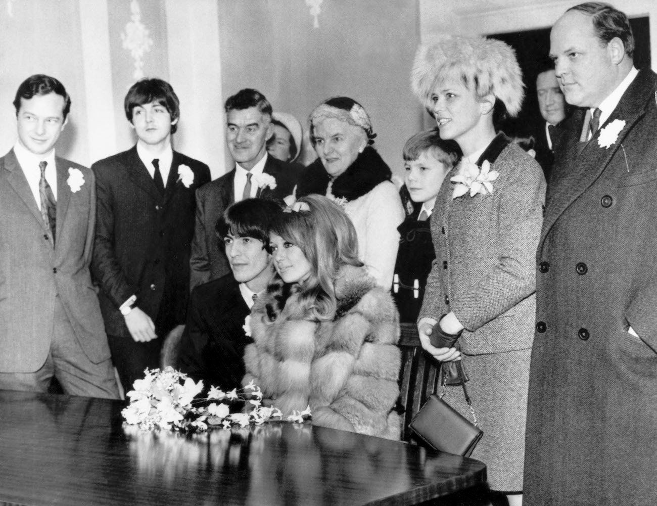 The Beatles' manager, Brian Epstein, and Paul McCartney at George Harrison and Pattie Boyd's wedding in 1966.