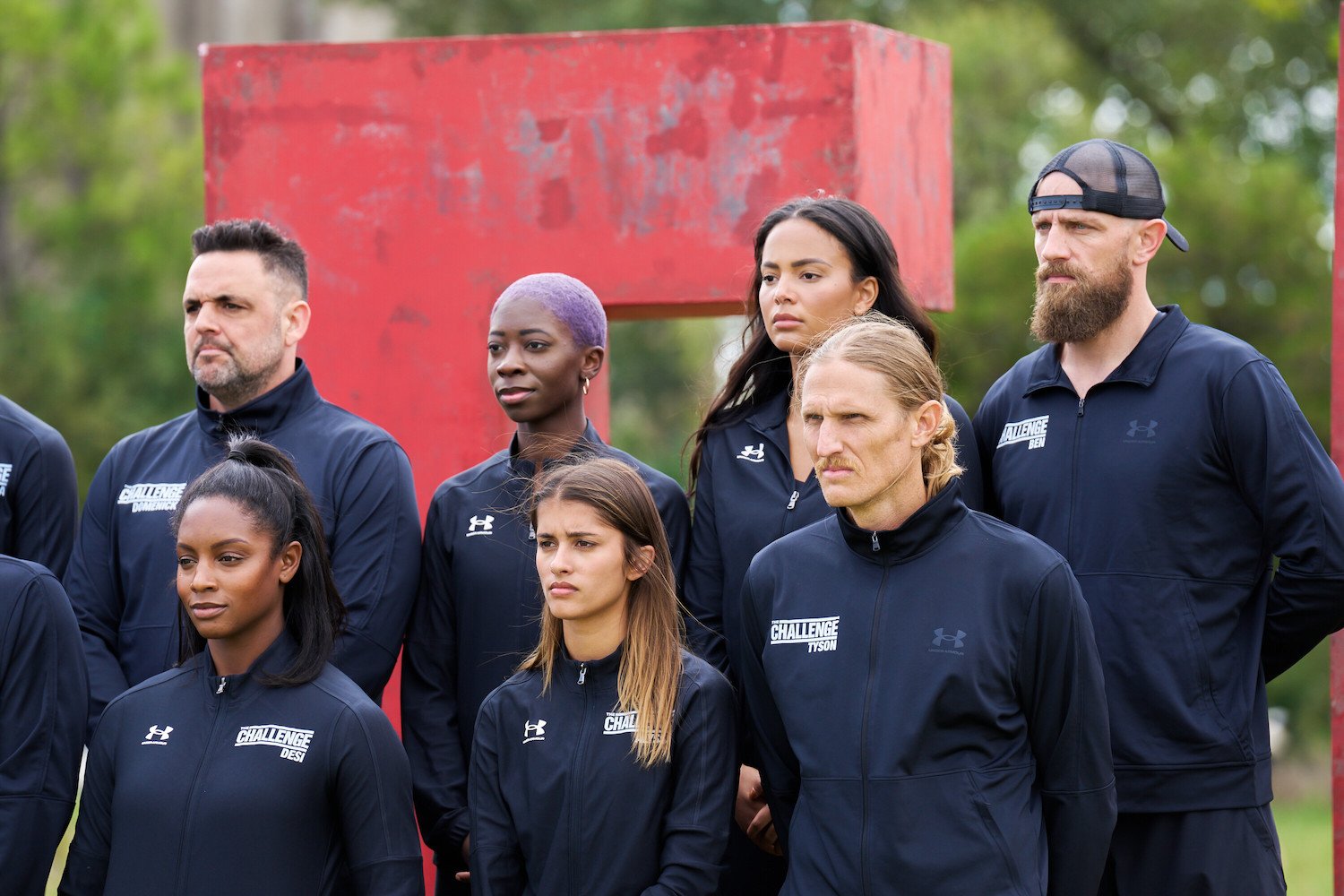 Domenick Abbate, Cashay Proudfoot, Kyra Green, Ben Driebergen, Desi Williams, Alyssa Lopez, and Tyson Apostol of 'The Challenge: USA' cast standing together