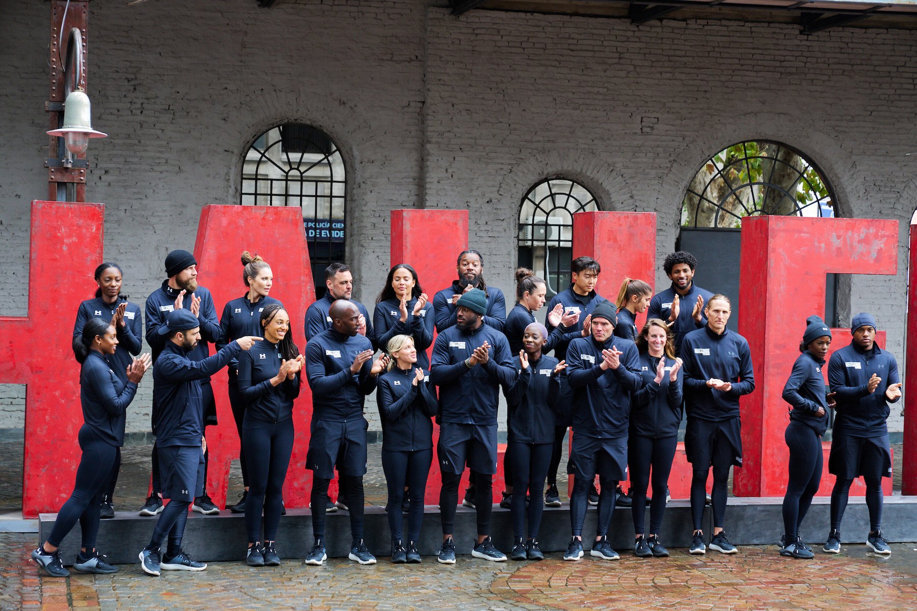 'The Challenge: USA' cast standing together in uniforms