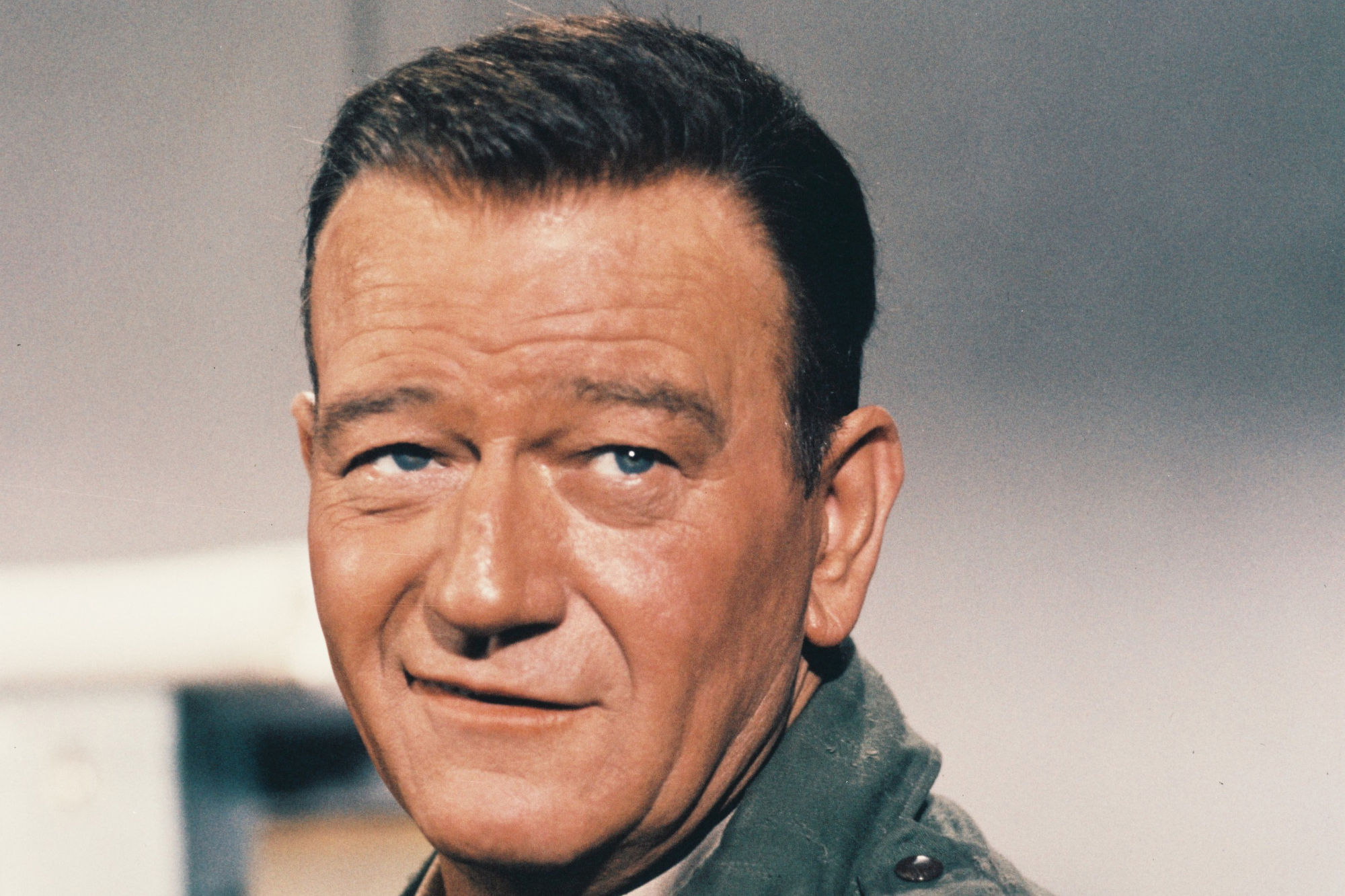 'The Longest Day' John Wayne as American Lt. Col. Benjamin Vandervoort giving a slight smile wearing his military uniform