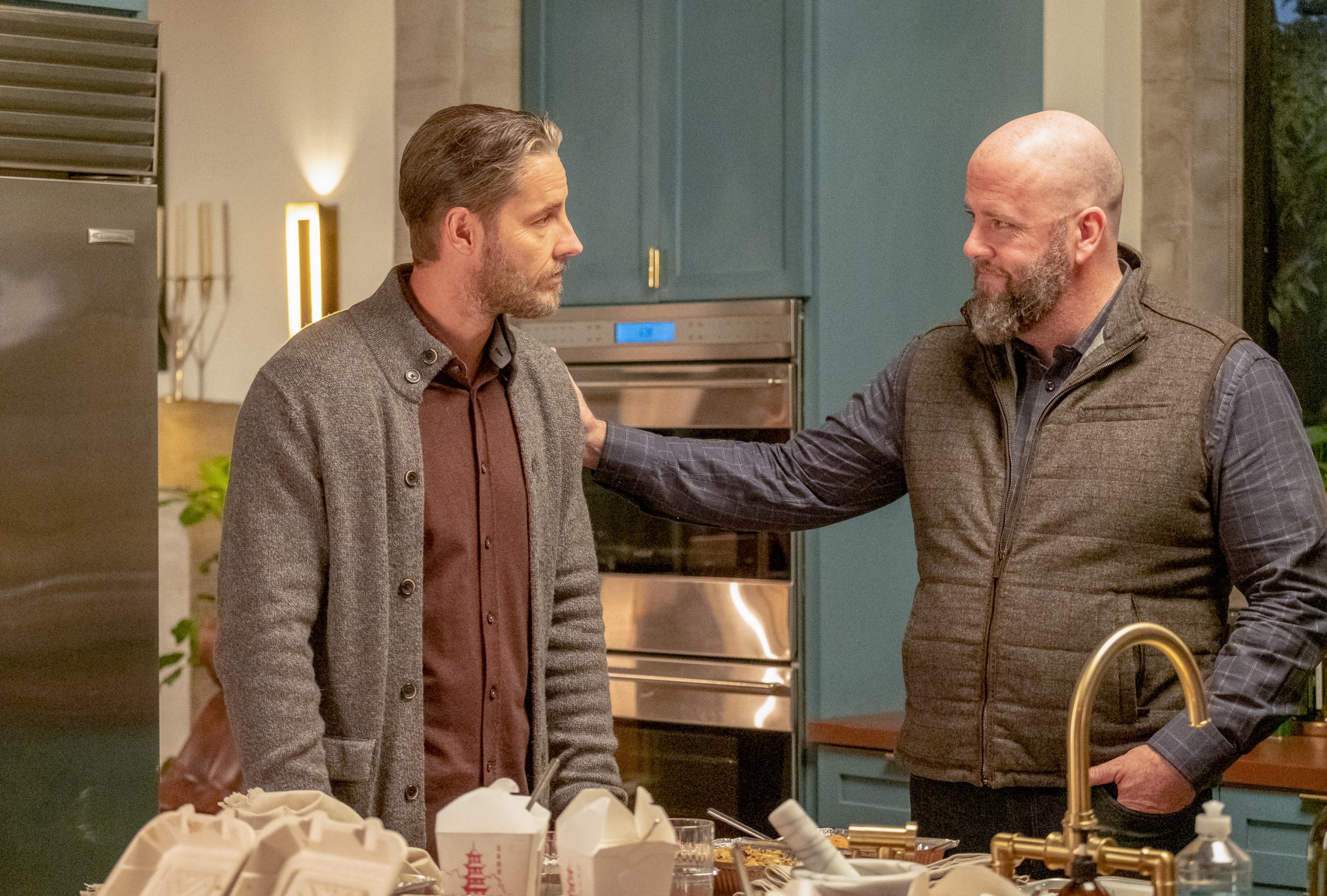 Justin Hartley and Chris Sullivan, in character as Kevin and Toby in the NBC show 'This Is Us,' share a scene.