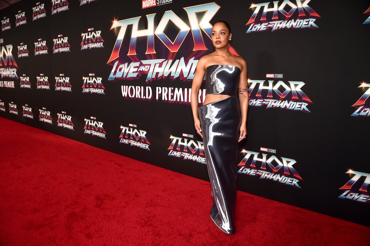 Tessa Thompson attends the 'Thor: Love and Thunder' world premiere, posing on the red carpet in a metallic gown.