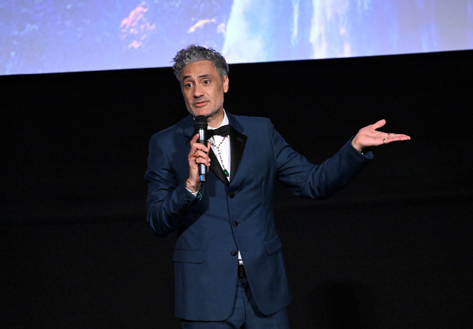 Taika Waititi, who directed 'Thor: Love and Thunder,' wears a dark blue tux.