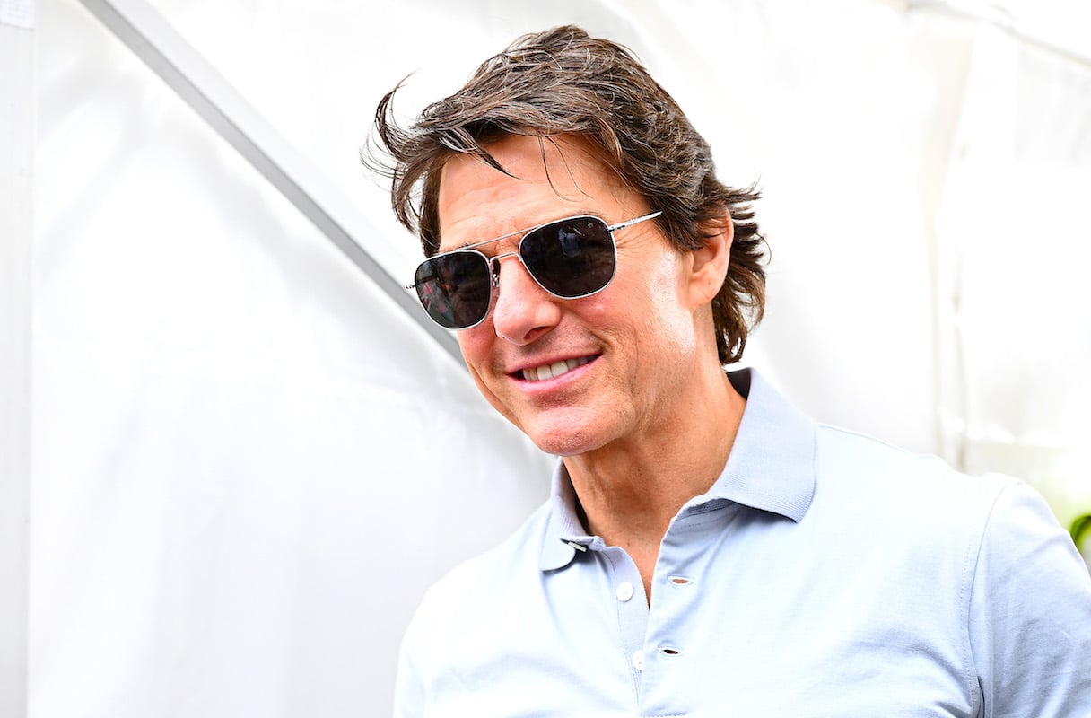 Tom Cruise wears sunglasses at the Gran Prix, in between workouts