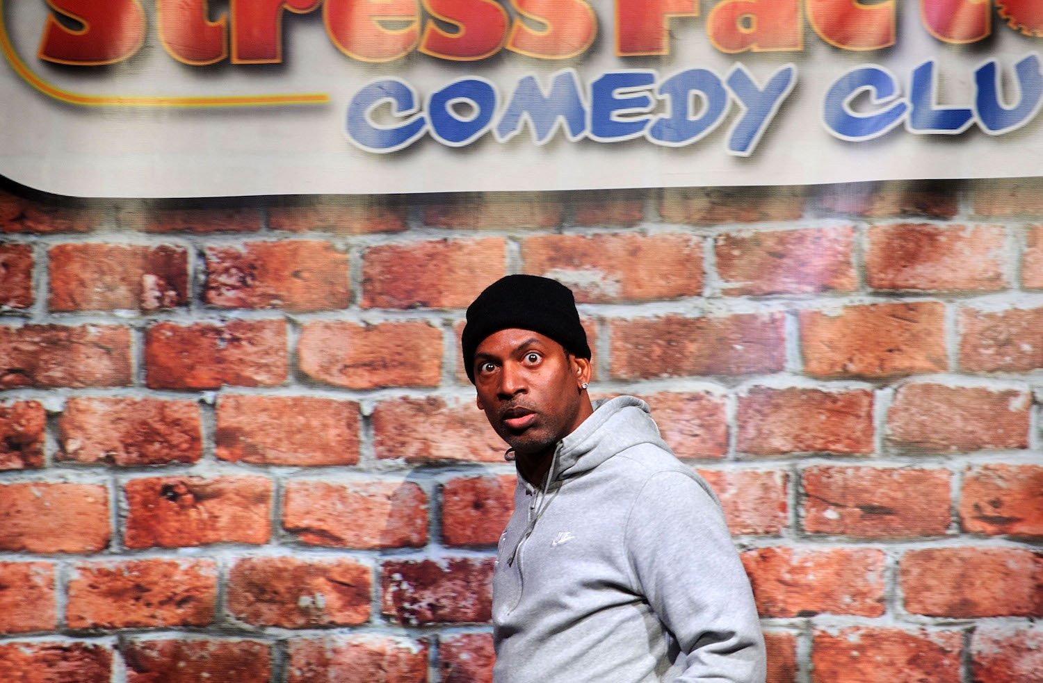 Chris Rock's brother, Tony Rock, performing at a comedy show