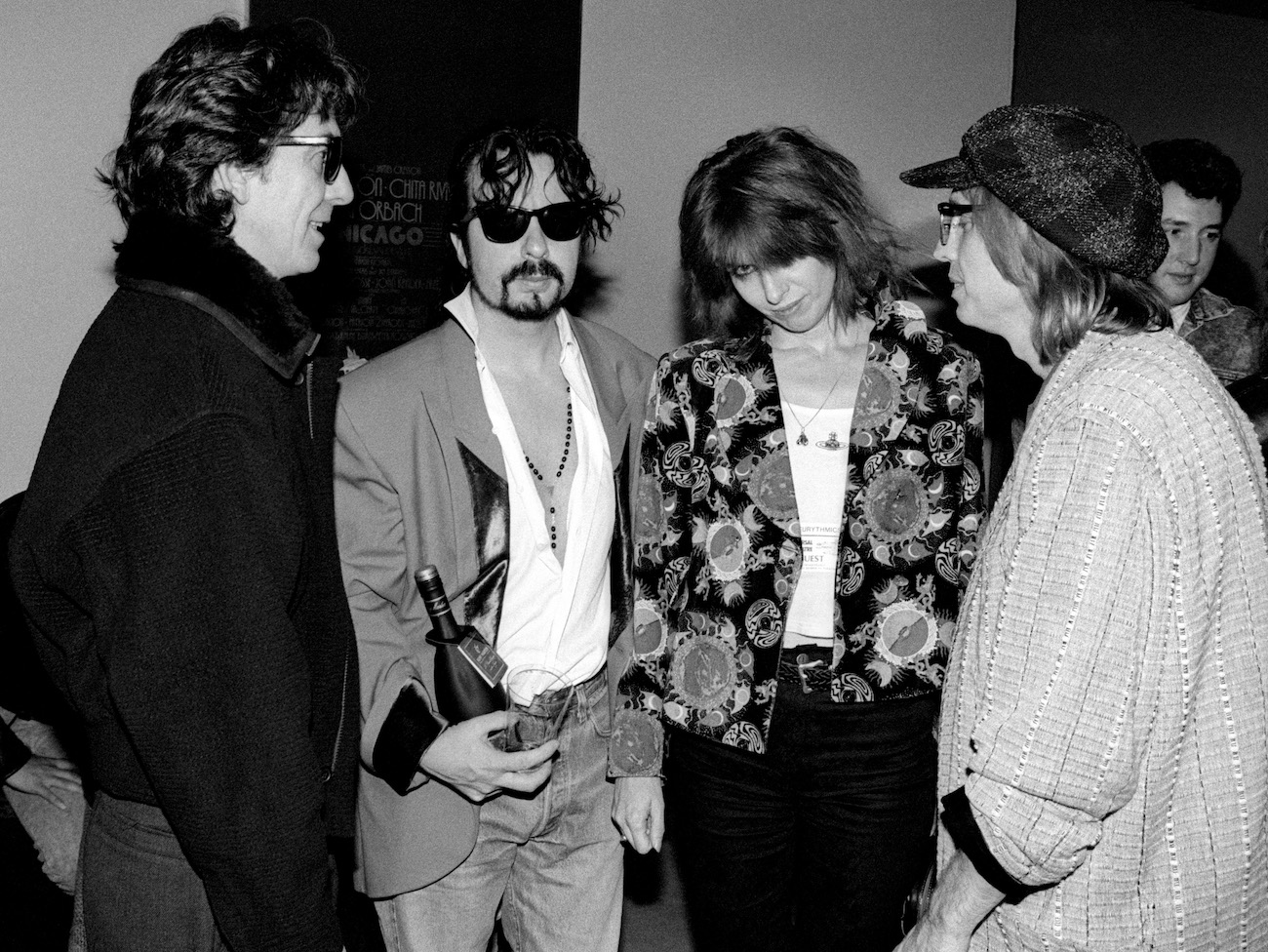 George Harrison, Dave Stewart, Chrissie Hynde, and Tom Petty at an event in 1990.