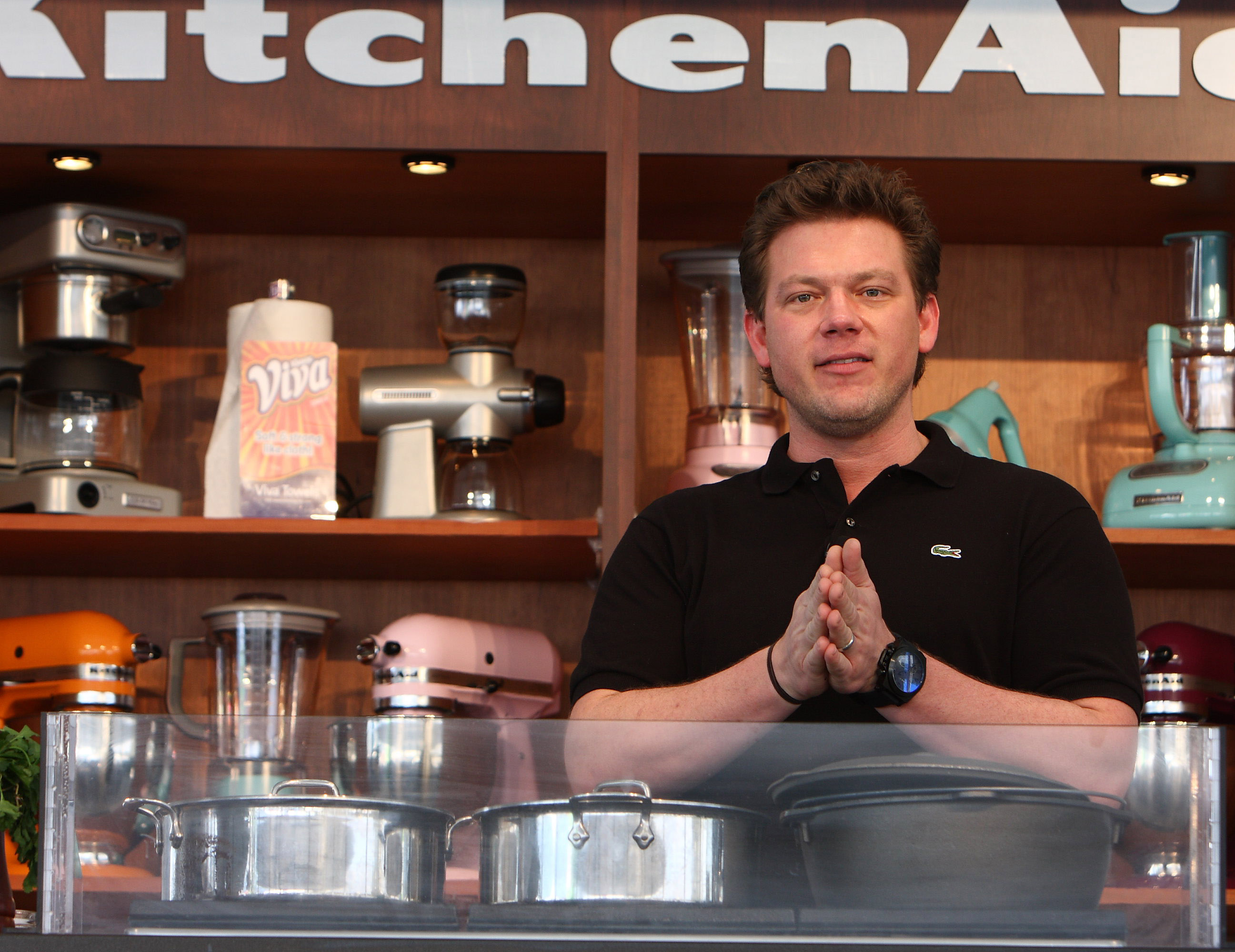 Chef Tyler Florence wears a long-sleeved black top in this photograph.