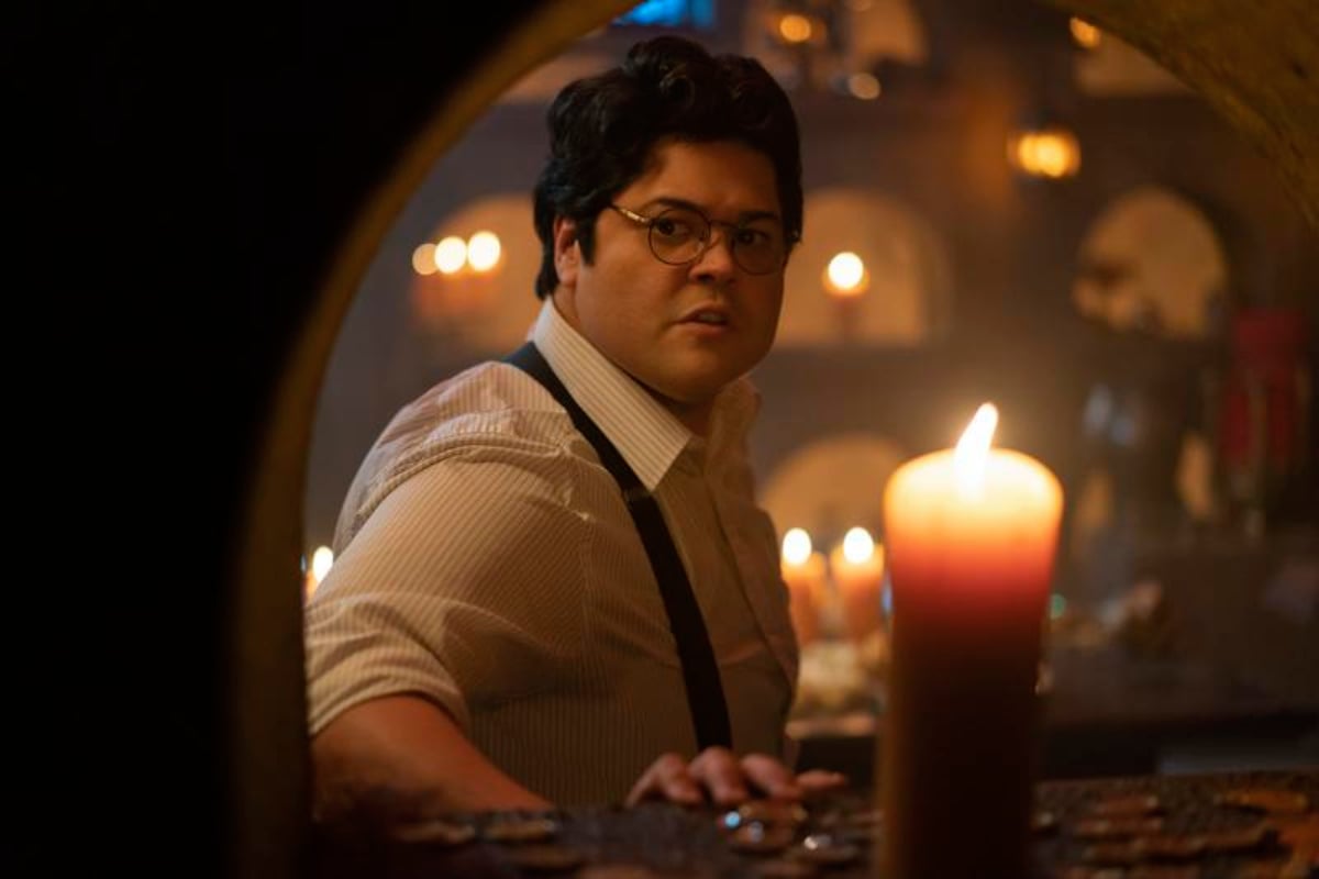 Harvey Guillen as Guillermo in What We Do in the Shadows Season 4, wearing a button-down shirt and suspenders.