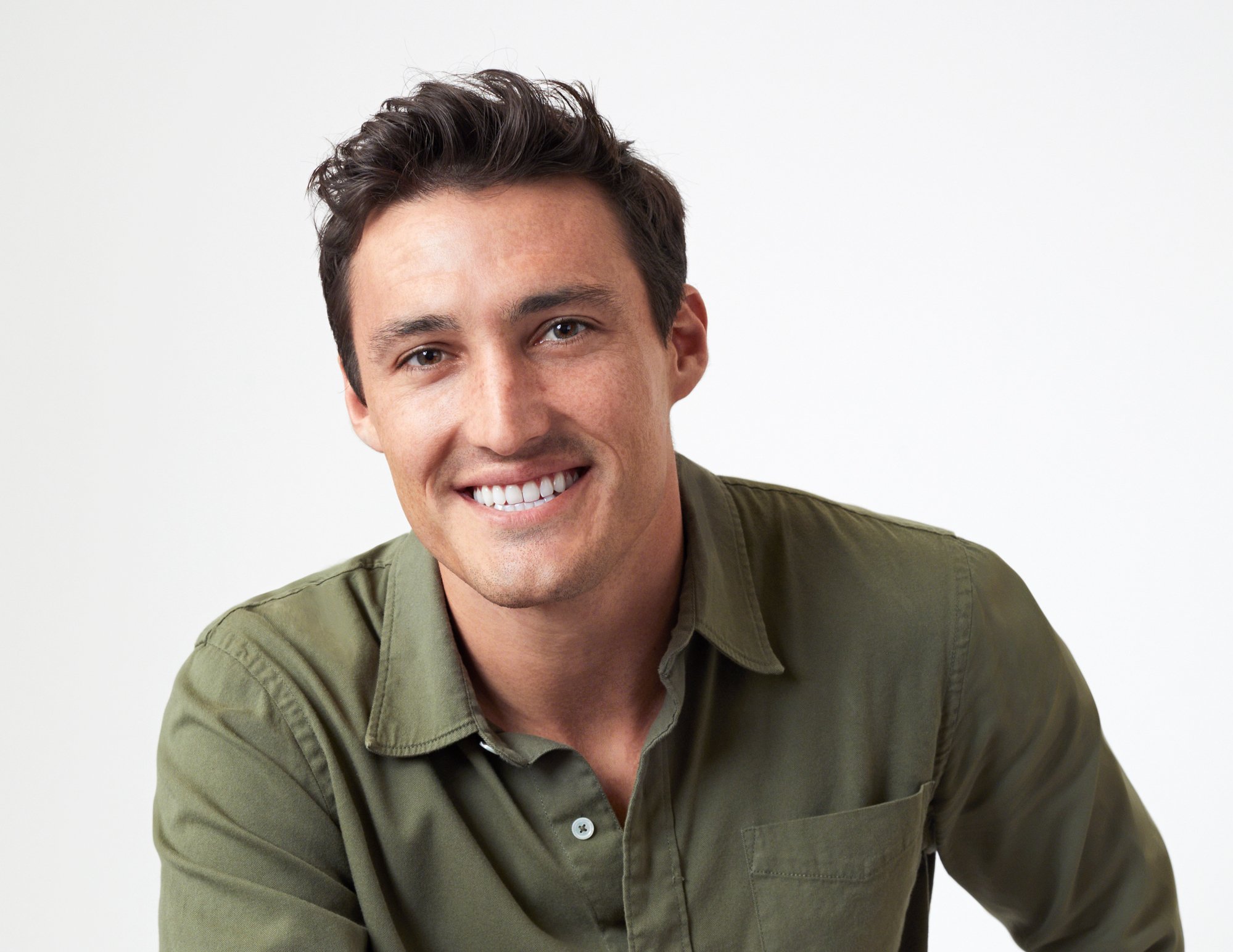 Tino Franco, seen here in an army green colored button down, got Rachel's First Impression Rose.