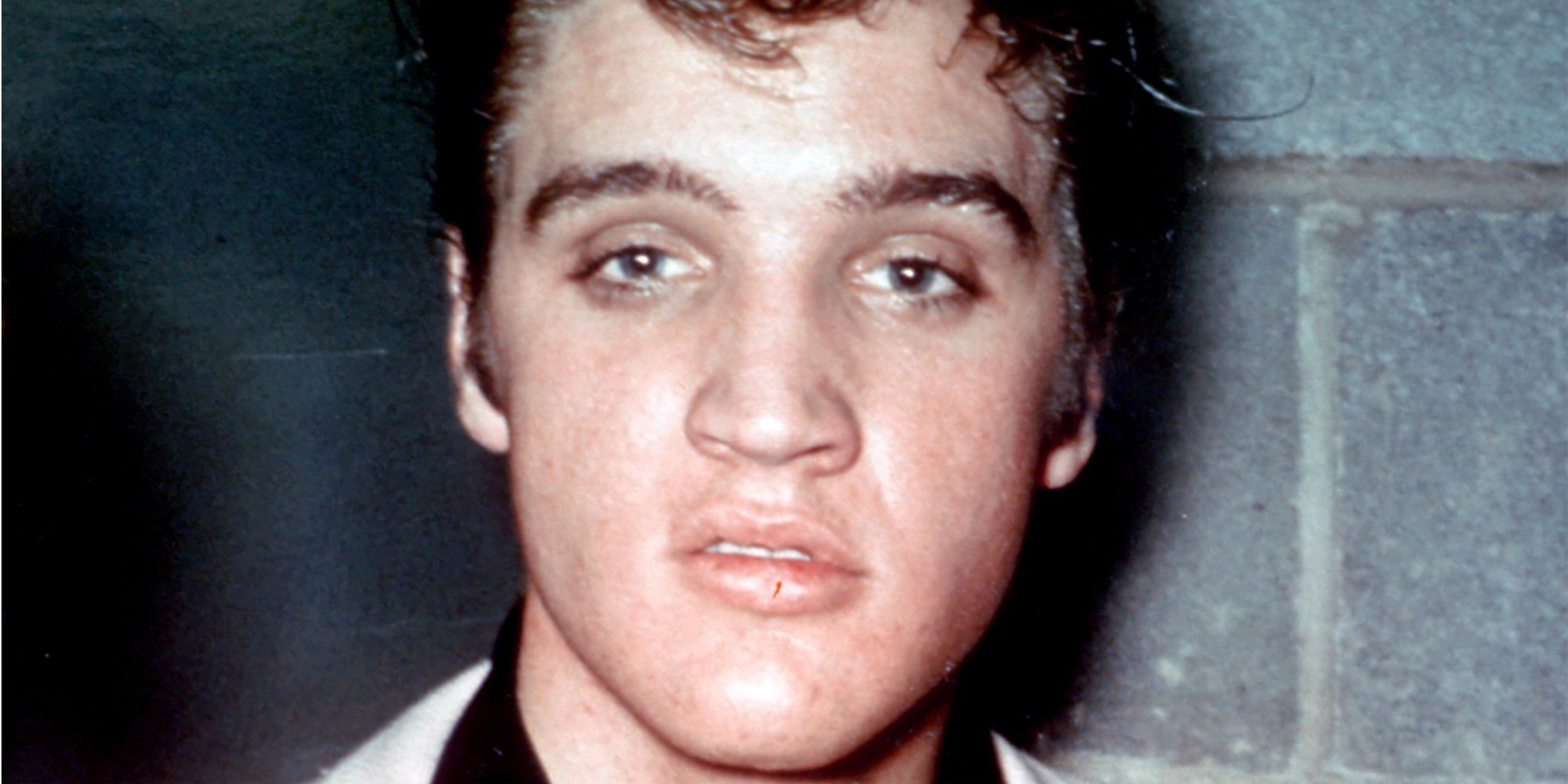 Reported germaphobe Elvis Presley looking directly at the camera.