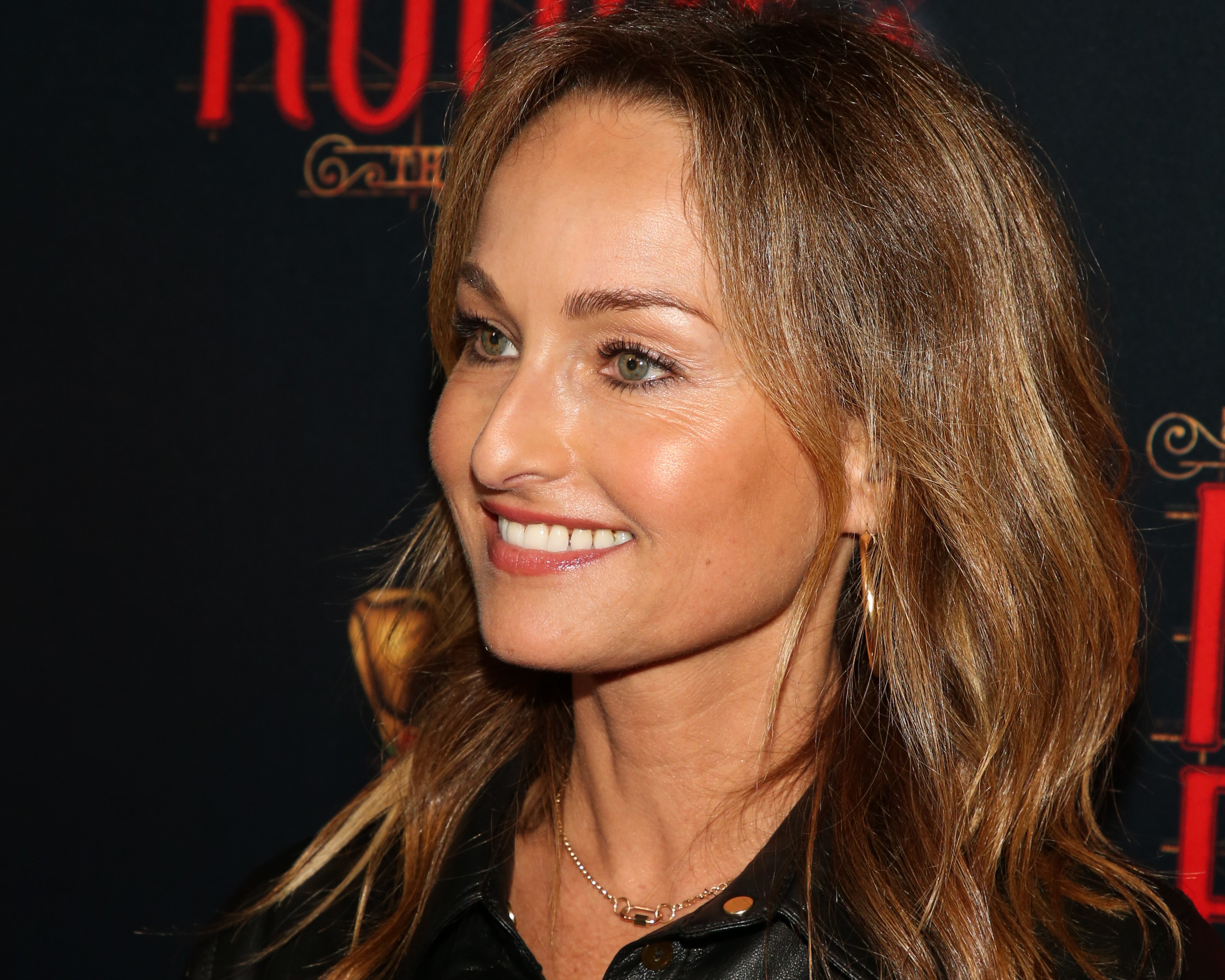 Celebrity chef Giada De Laurentiis wears a black shirt in this photograph.