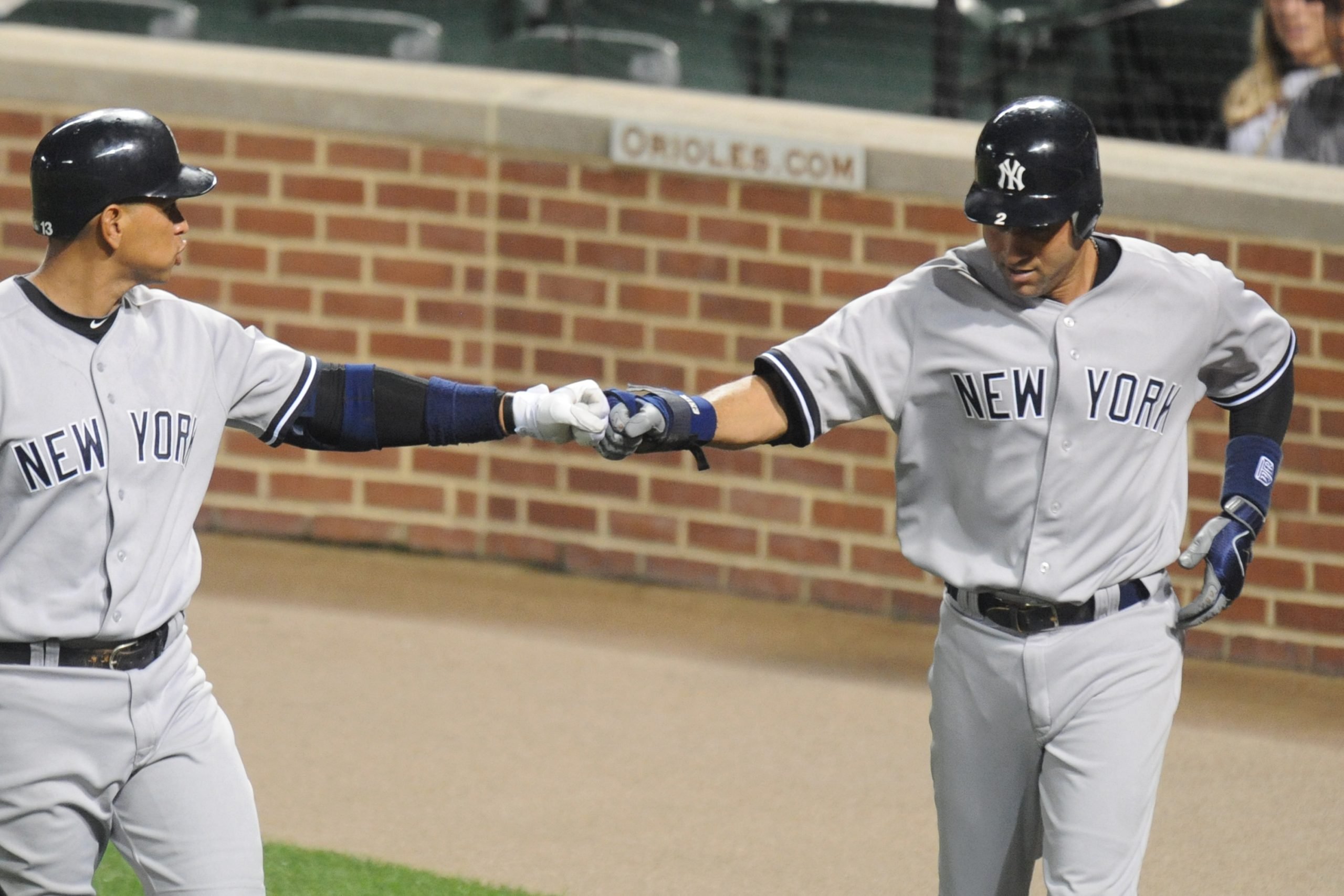 Derek Jeter and Alex Rodriguez during the eighth inning of a baseball game against the Baltimore Orioles at Oriole Park at Camden Yards on August 26, 2011