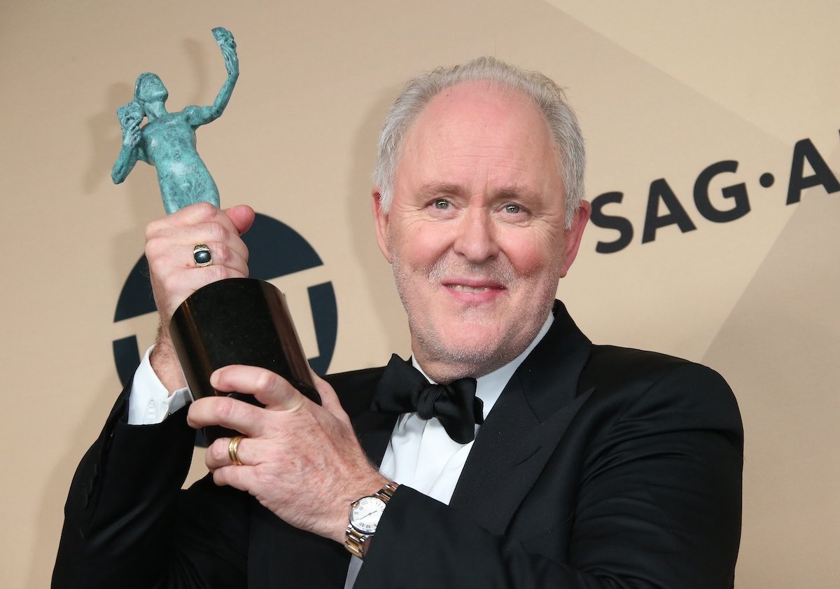 John Lithgow poses with his award for Outstanding Performance by a Male Actor in a Drama Series for 'The Crown' at the 23rd Annual Screen Actors Guild Awards.