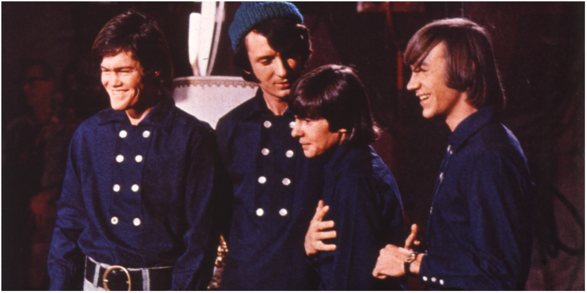 The Monkees cast includes Davy Jones, Mike Nesmith, Mickey Dolenz, and Peter Tork.