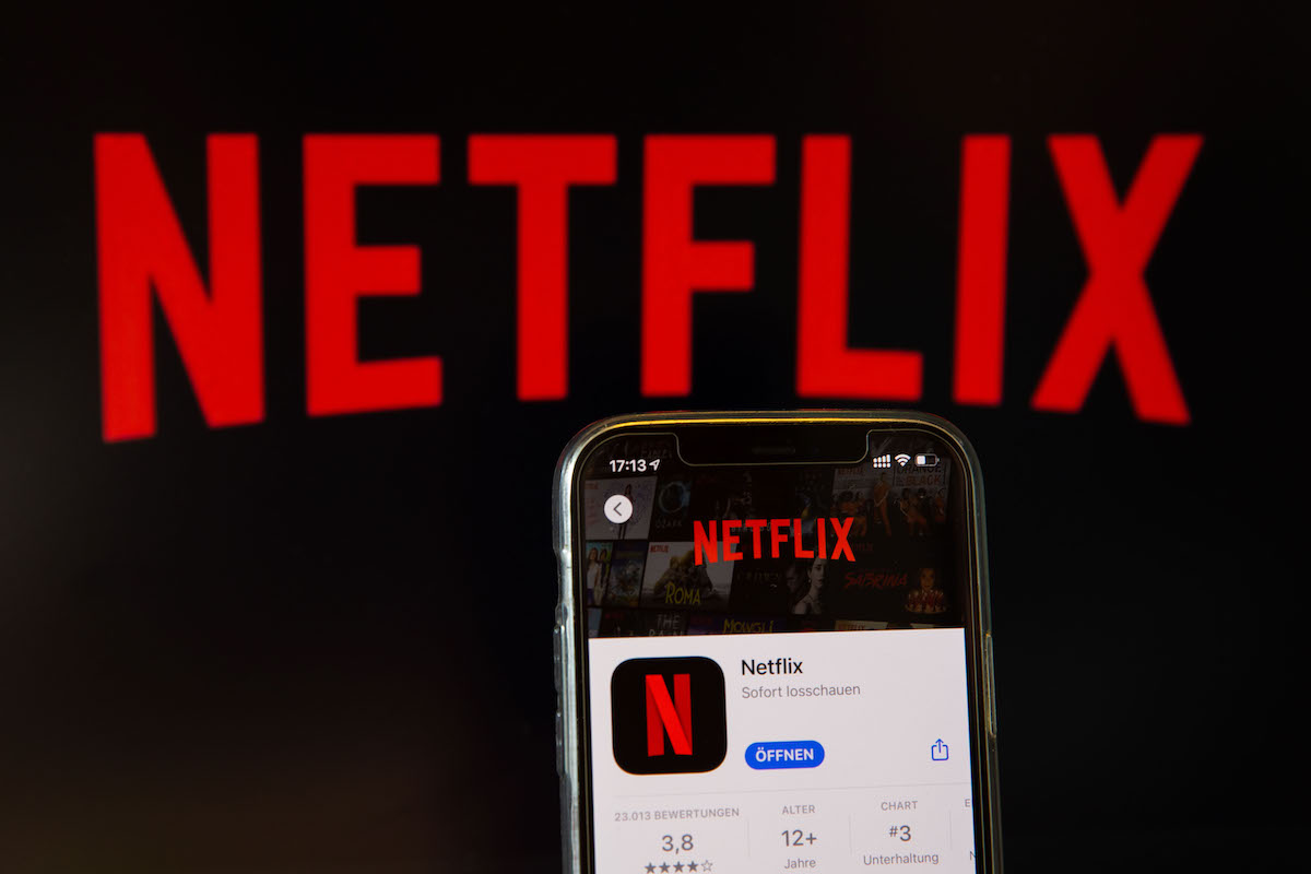 Netflix illustration of the logo and app on a phone