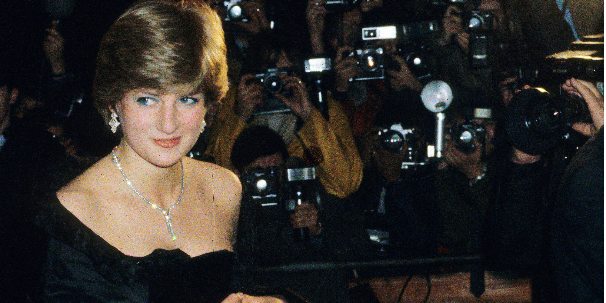 Princess Diana wears a black strapless gown from designers David and Elizabeth Emanuel ahead of her wedding to Prince Charles.