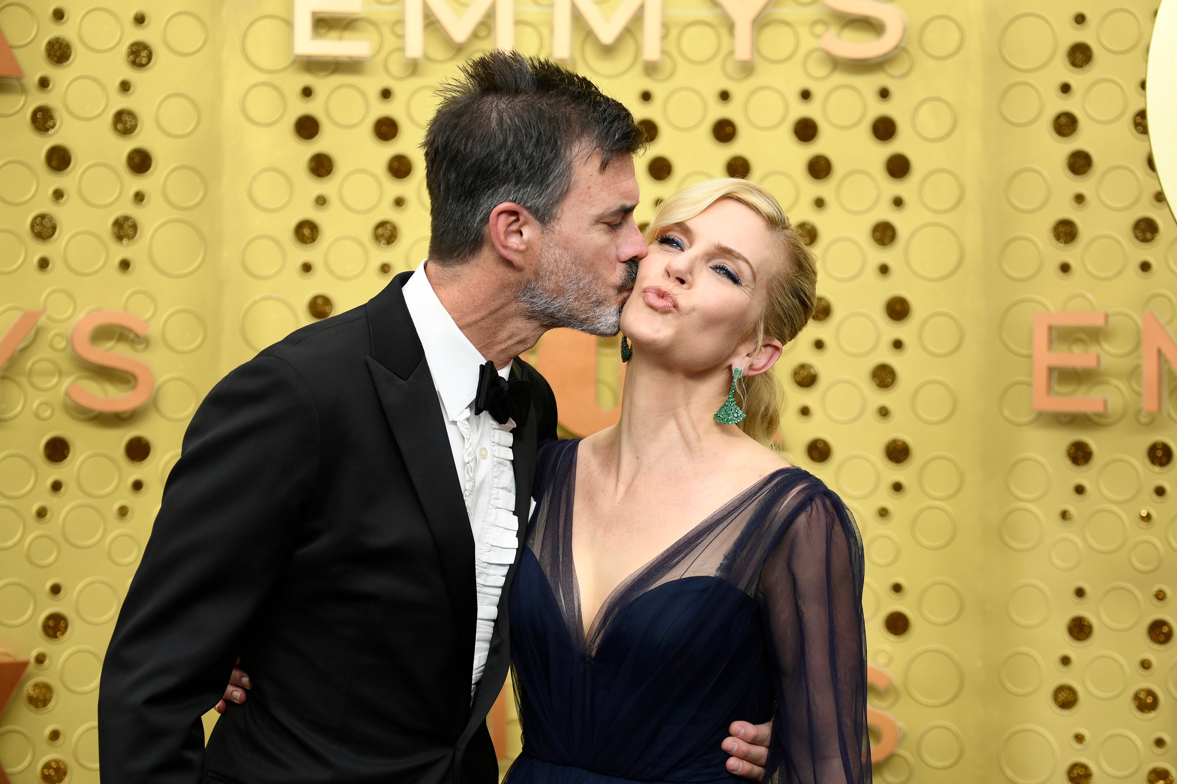 Graham Larson kissing Rhea Seehorn on the cheek at the 71st Emmy Awards