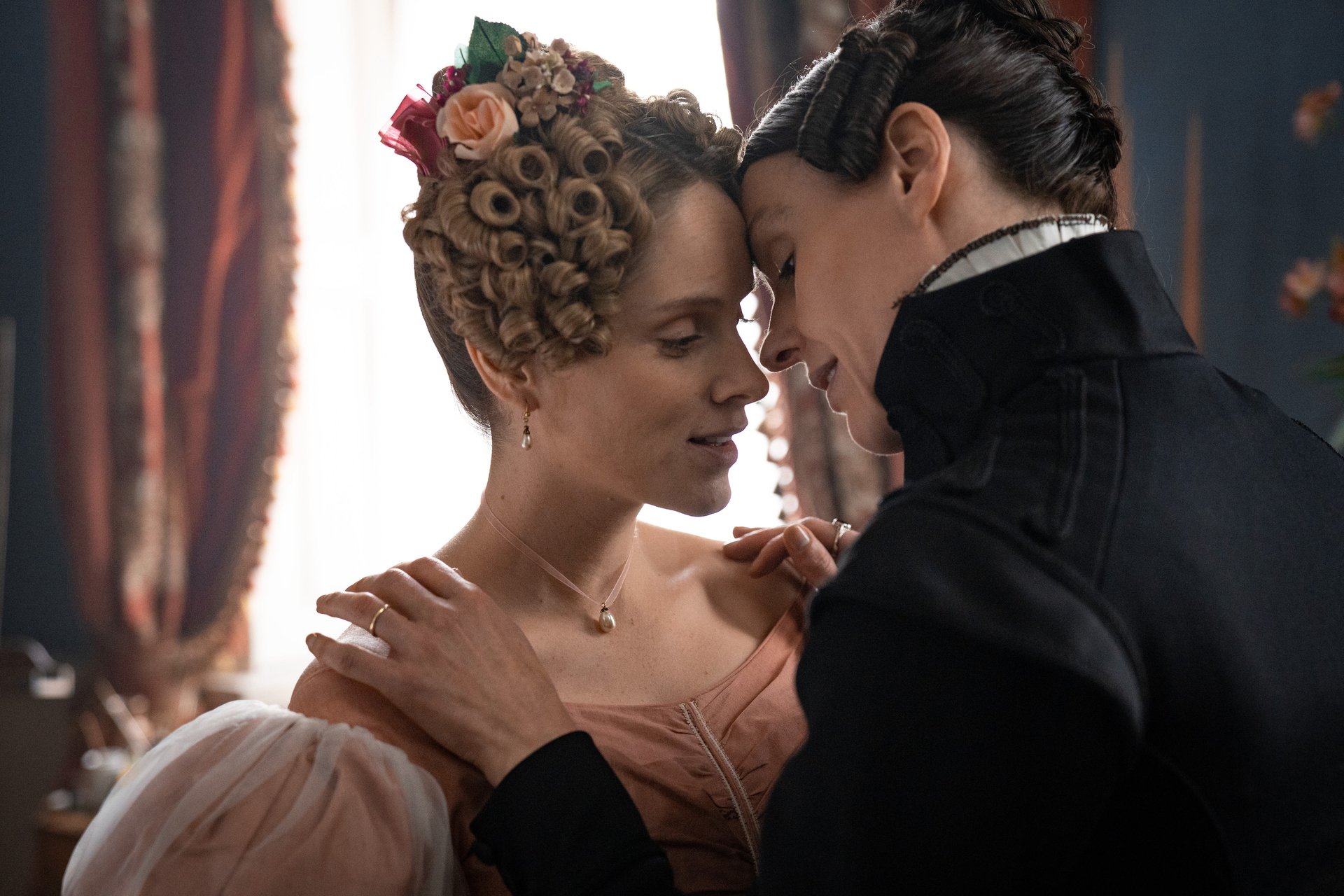 Anne leaning in to kiss Ann in the recently canceled HBO series 'Gentleman Jack'