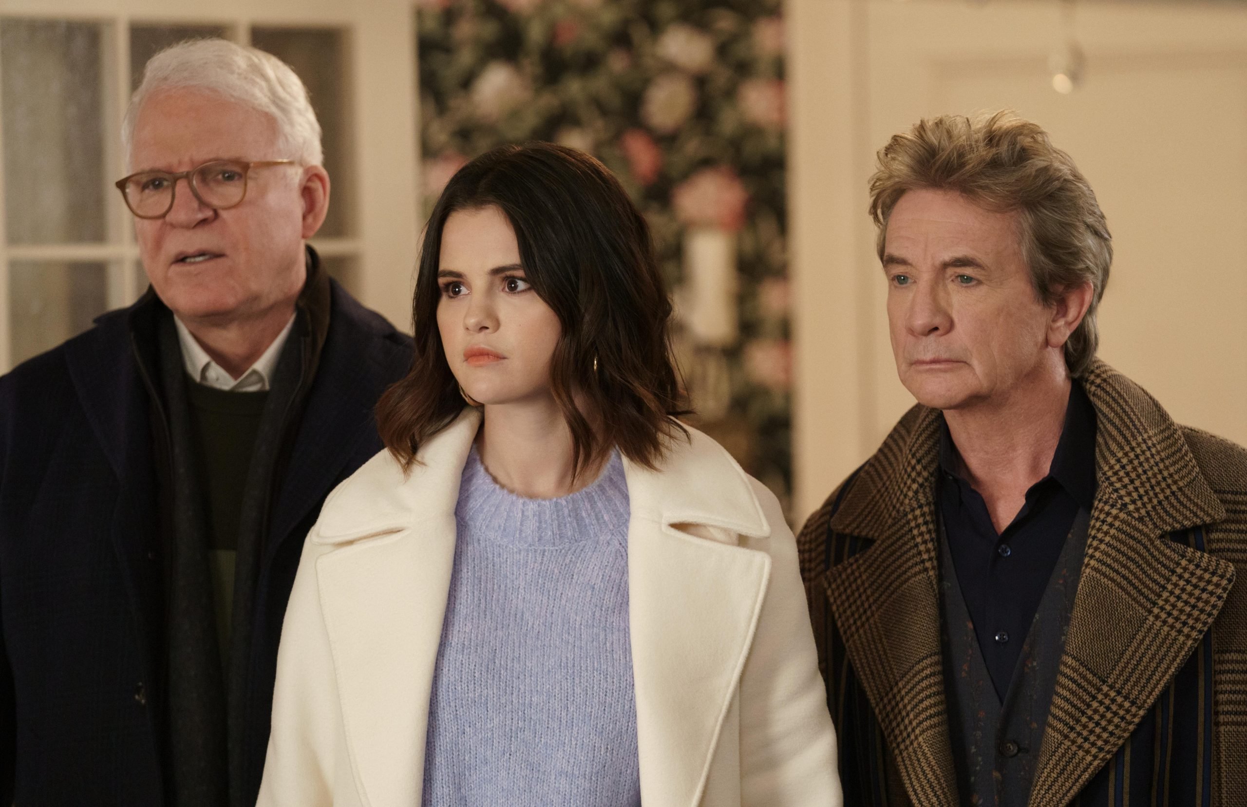 A still of Charles, Mabel, and Oliver from ‘Only Murders in the Building’ Season 2 showing how Selena Gomez’s height is less than Steve Martin’s and Martin Short’s