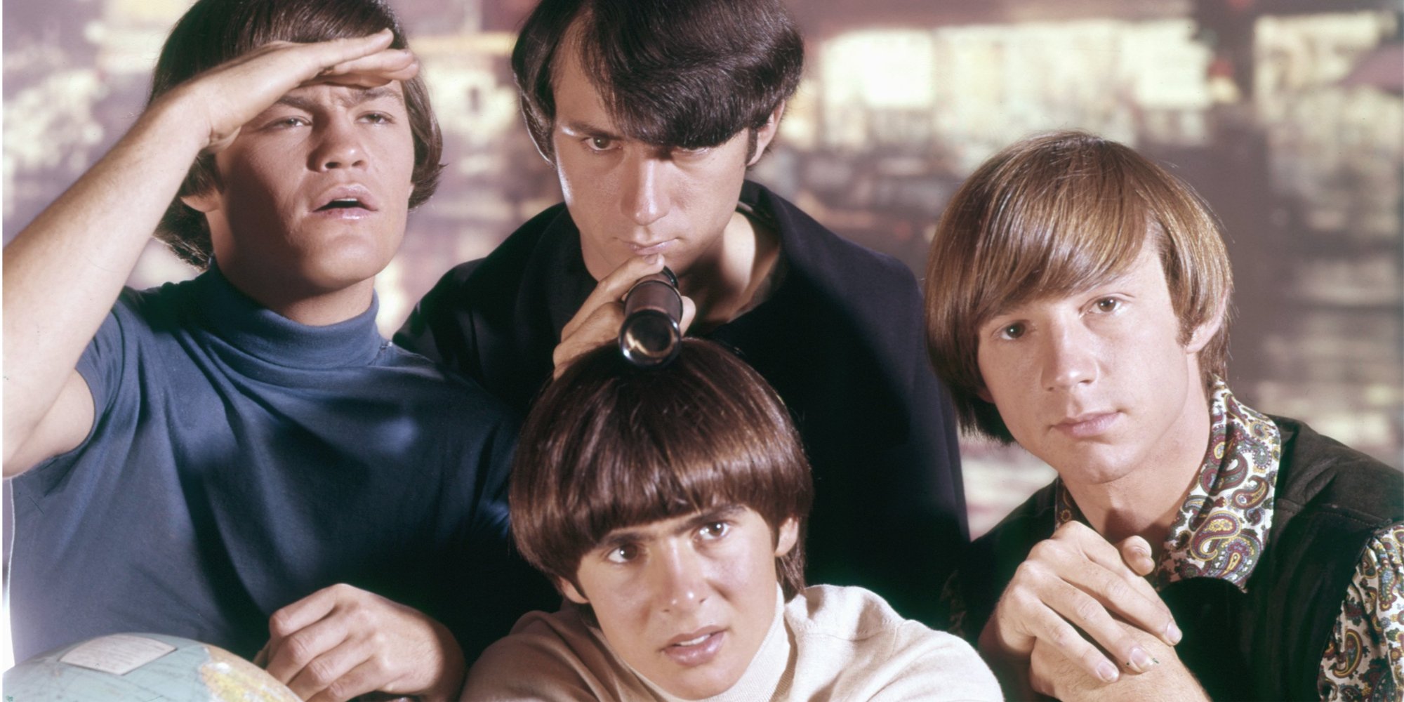 The Monkees cast includes Davy Jones, Mike Nesmith, Mickey Dolenz, and Peter Tork.