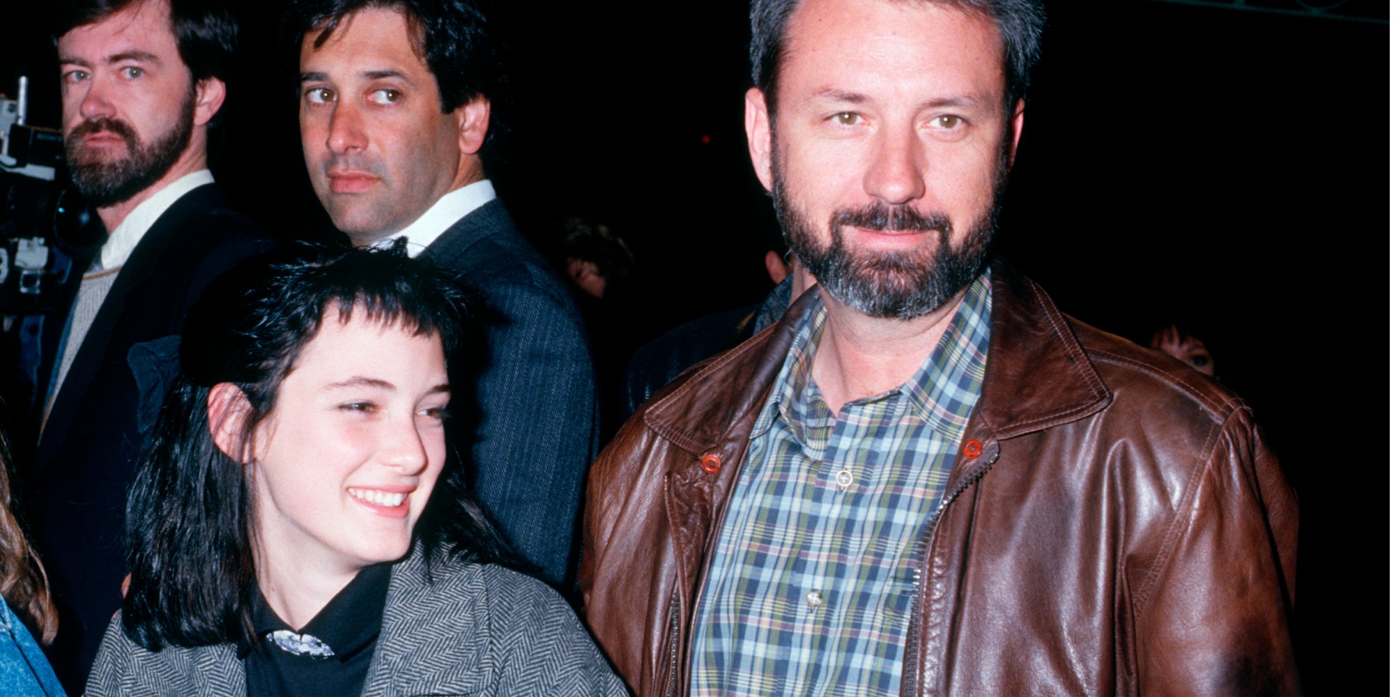 Winona Ryder and Mike Nesmith attend a movie premiere in 1987.