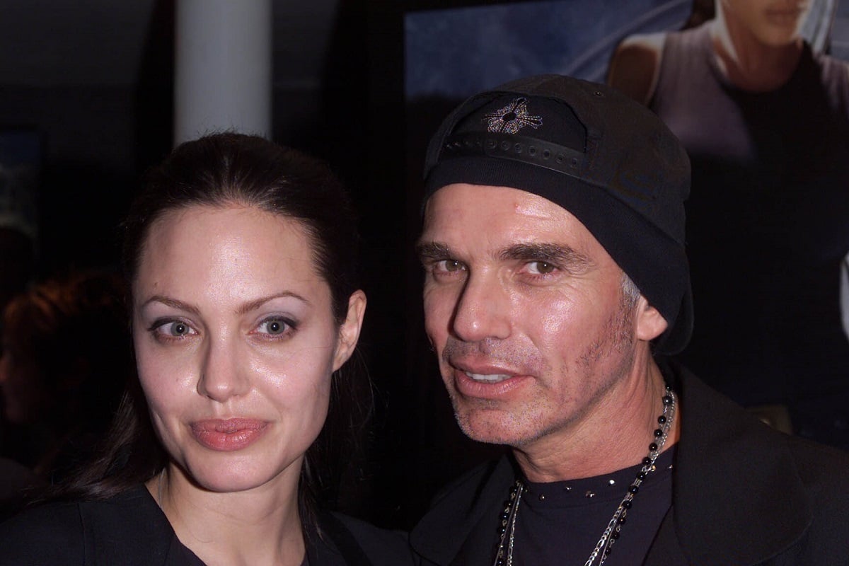 Billy Bob Thornton smiling alongside Angelina Jolie.