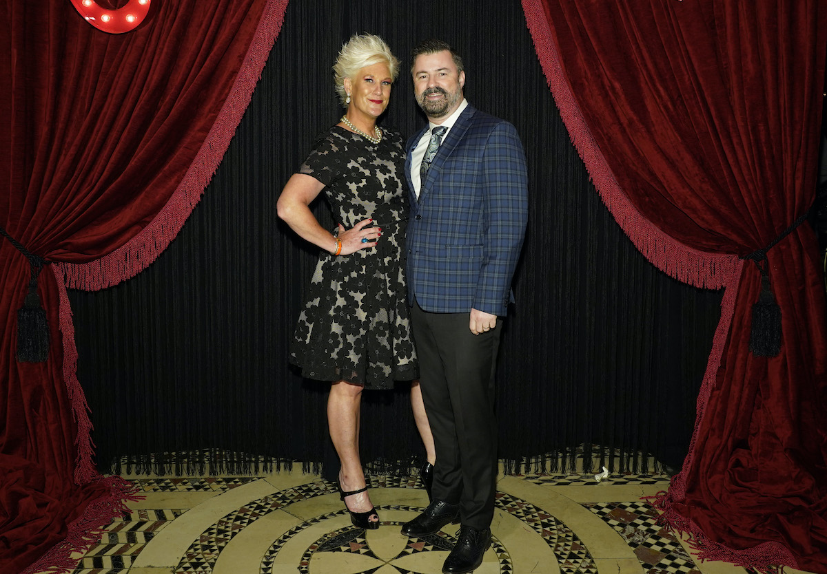Anne Burrell and Stuart Claxton smile