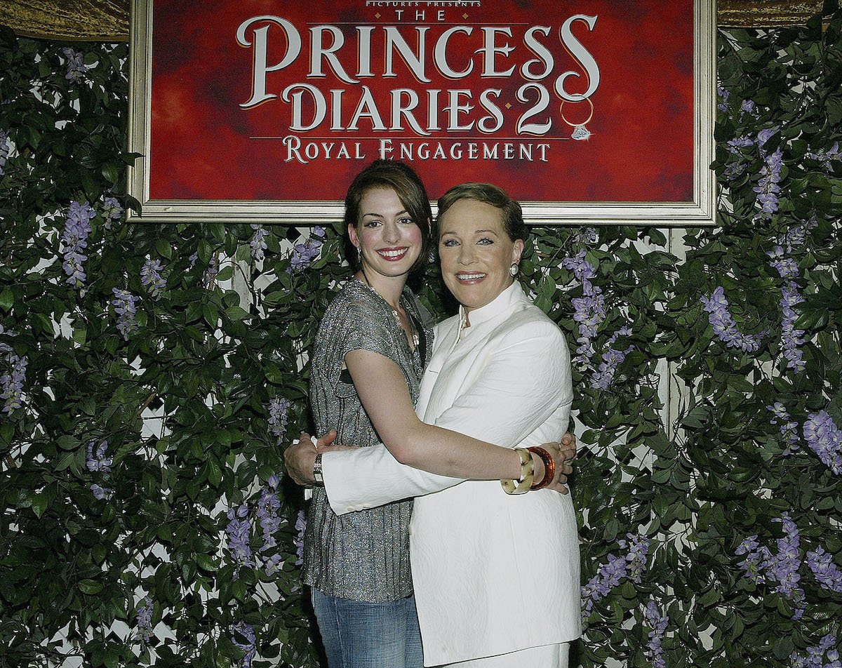 Anne Hathaway and Julie Andrews smiling