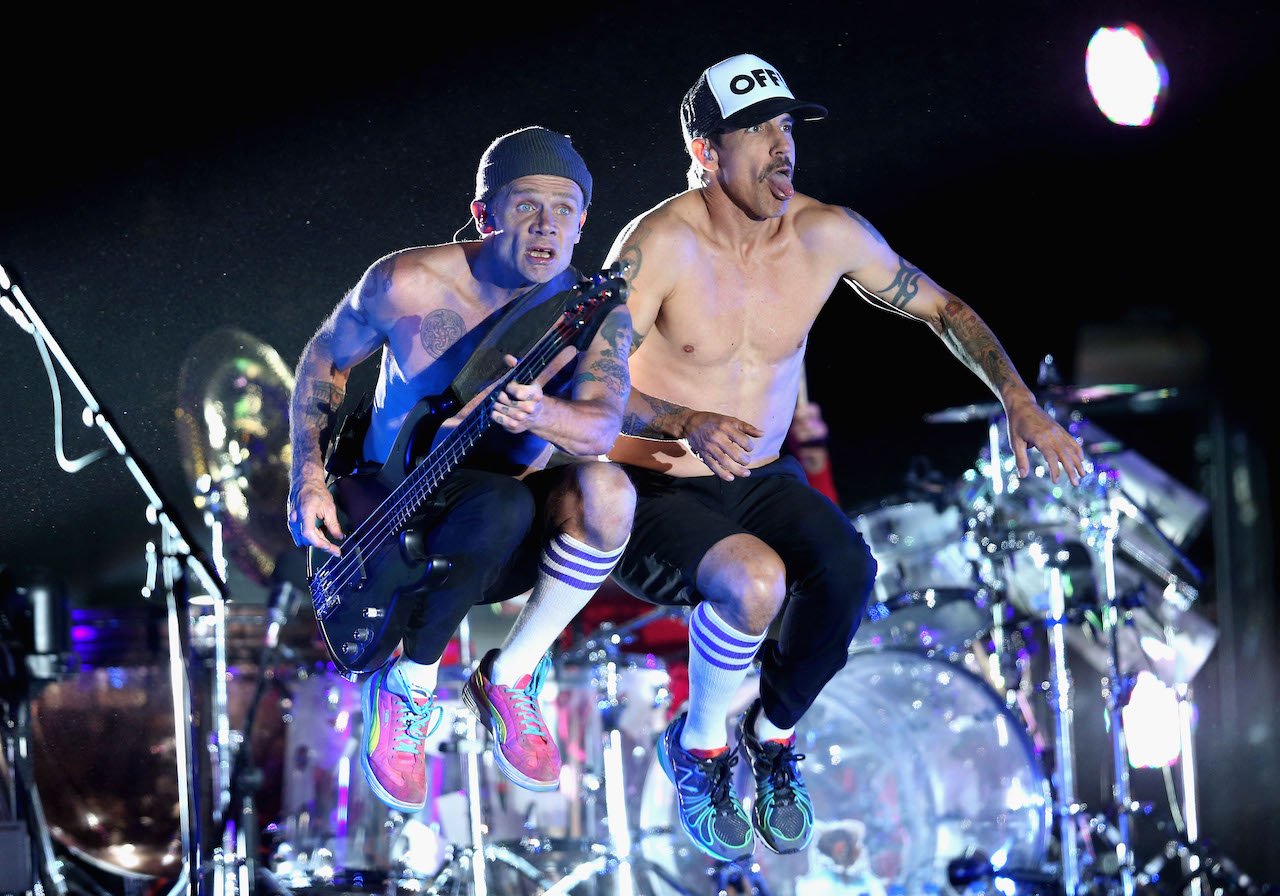 Flea and Anthony Kiedis, pictured at Coachella in 2013, have massive net worths