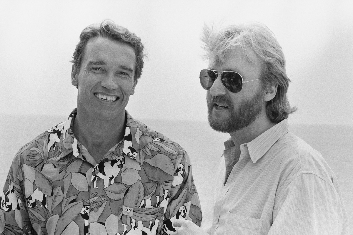 Arnold Schwarzenegger smiling alongside James Cameron.