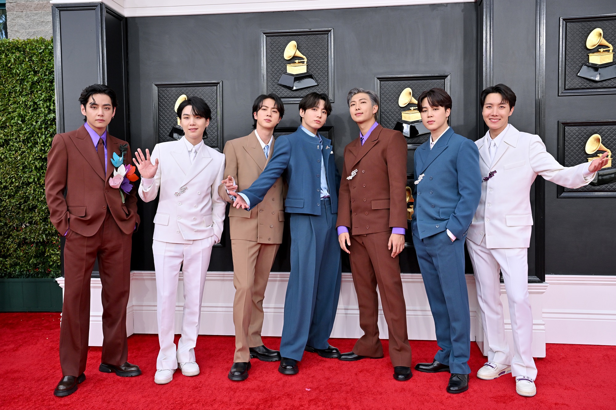 V, Suga, Jin, Jungkook, RM, Jimin, and J-Hope of BTS at the 2022 Grammy Awards
