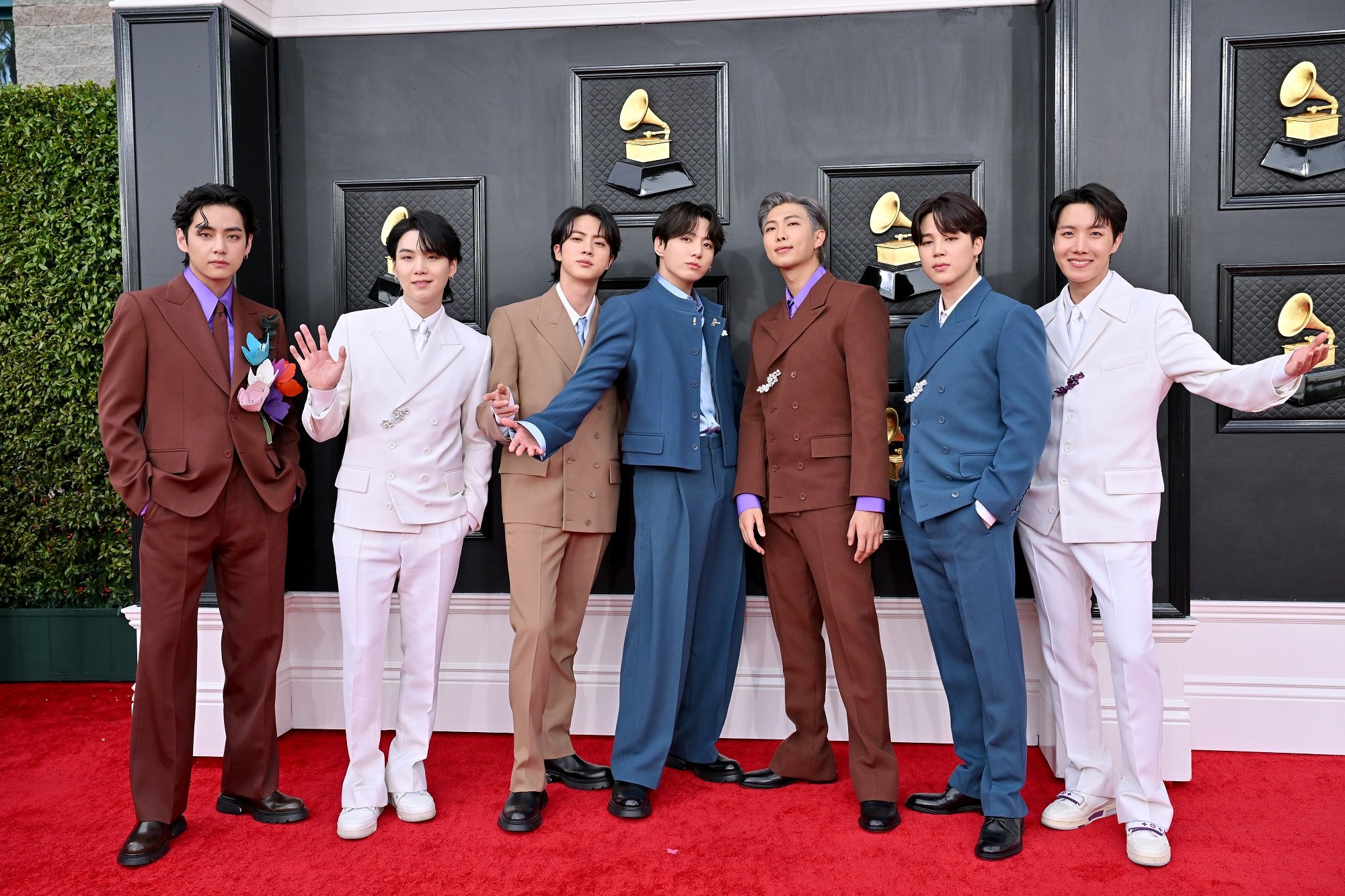 V, Suga, Jin, Jungkook, RM, Jimin, and J-Hope of BTS attend the 2022 Grammy Awards