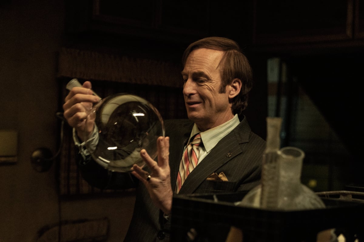 Bob Odenkirk as Saul Goodman in Better Call Saul Season 6 Episode 11. Saul holds up a boiling flask. 