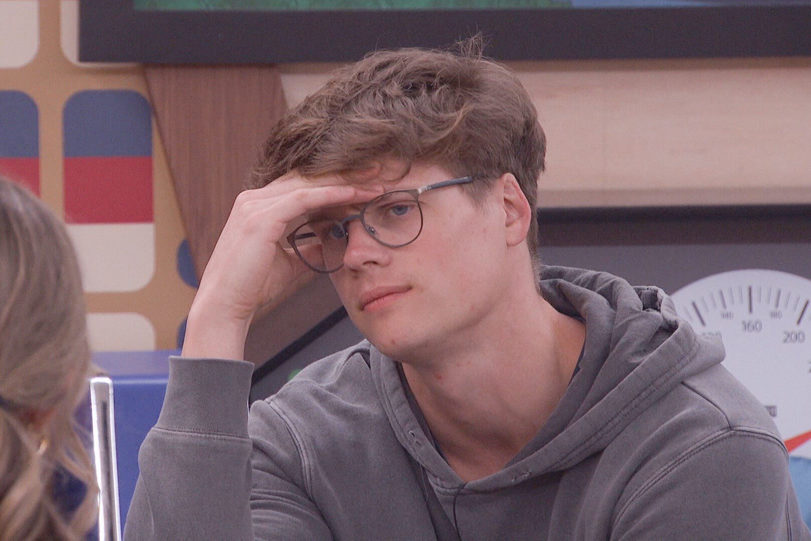 Kyle Capener, who stars in 'Big Brother 24' on CBS, wears a gray hoodie.