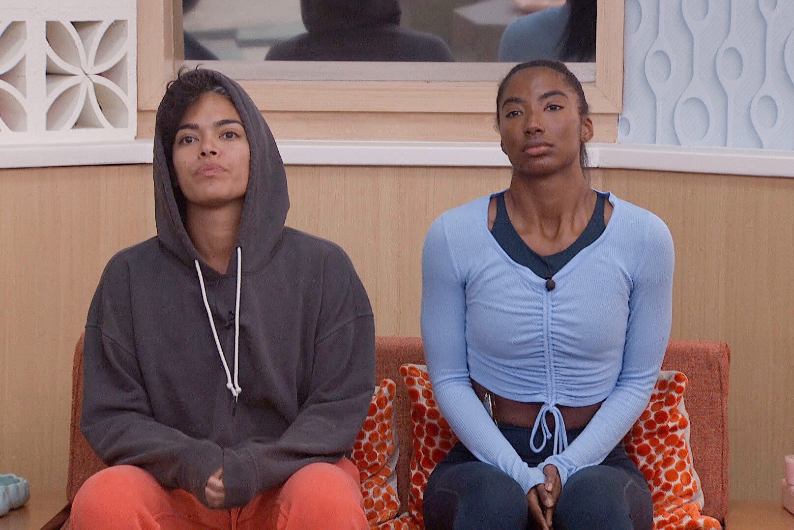 According to 'Big Brother 24' spoilers, Nicole Layog and Taylor Hale are on the block during week four. The two houseguests sit in the elimination chairs. Nicole wears a gray hoodie and orange pants. Taylor wears a light blue long-sleeved shirt and gray pants.