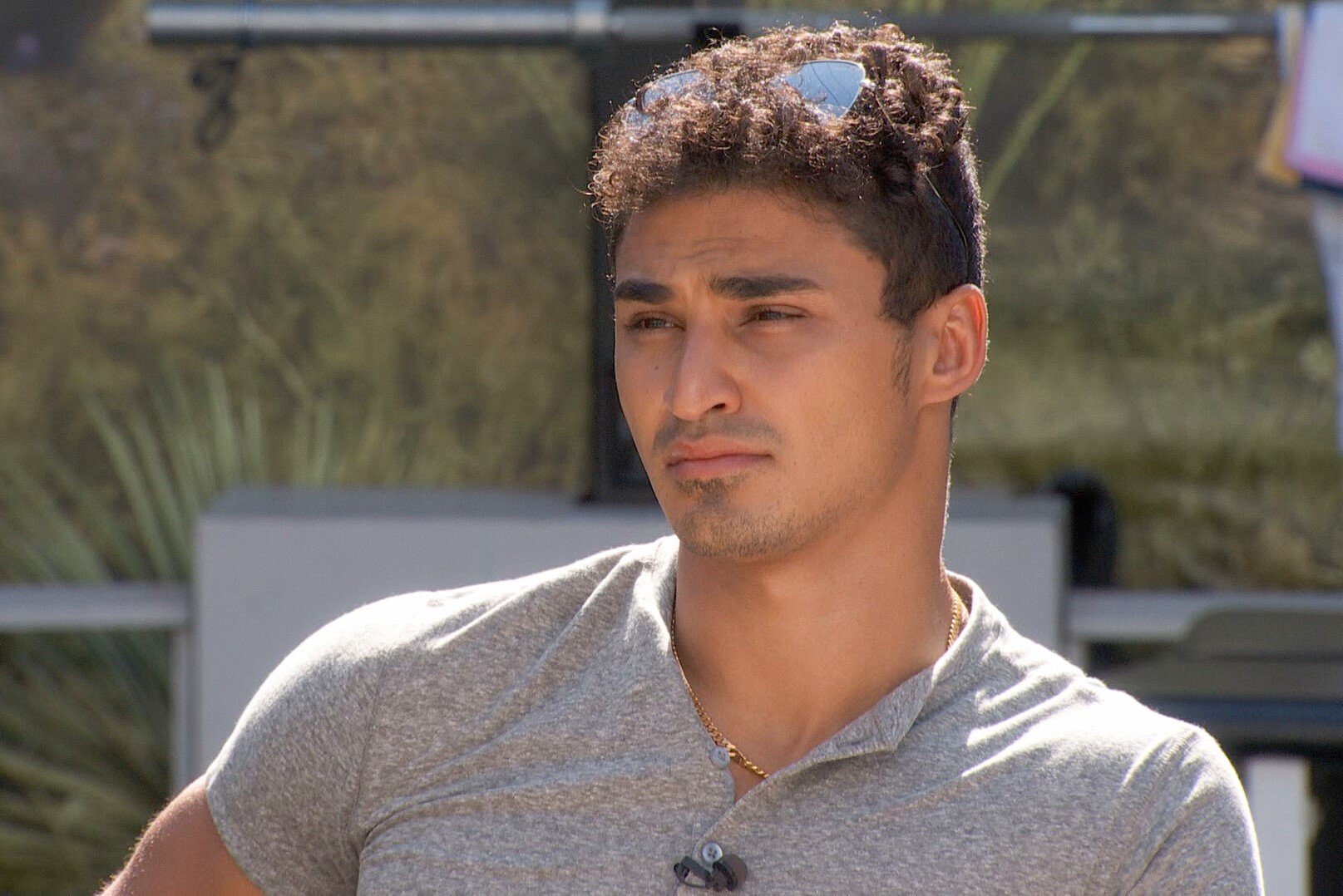 Joseph Abdin, who didn't win the Power of Veto during week seven of 'Big Brother 24,' wears a light gray shirt and sunglasses on his head.