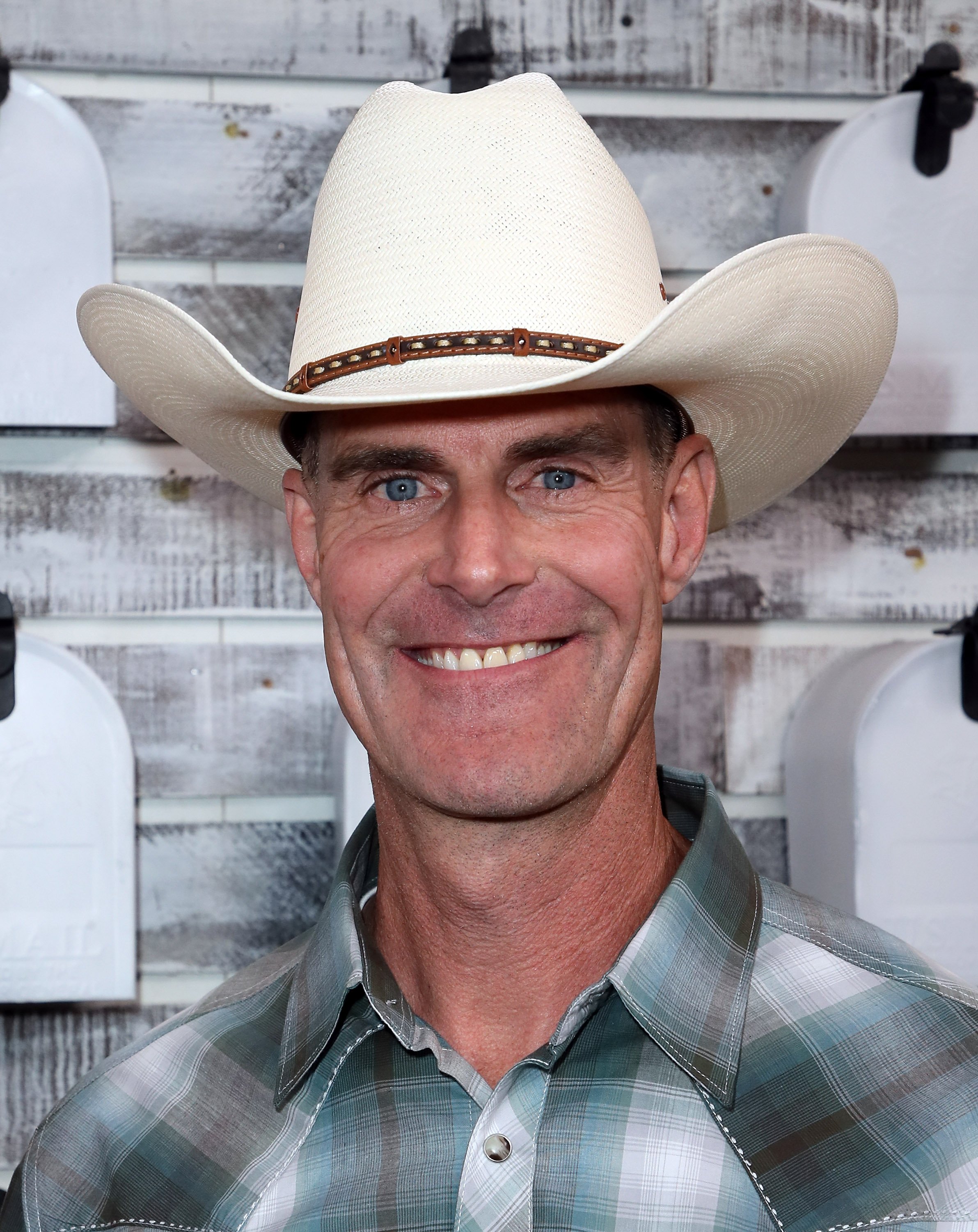 Brett Waterman of the Magnolia Network series 'Restored' wearing a cowboy hat
