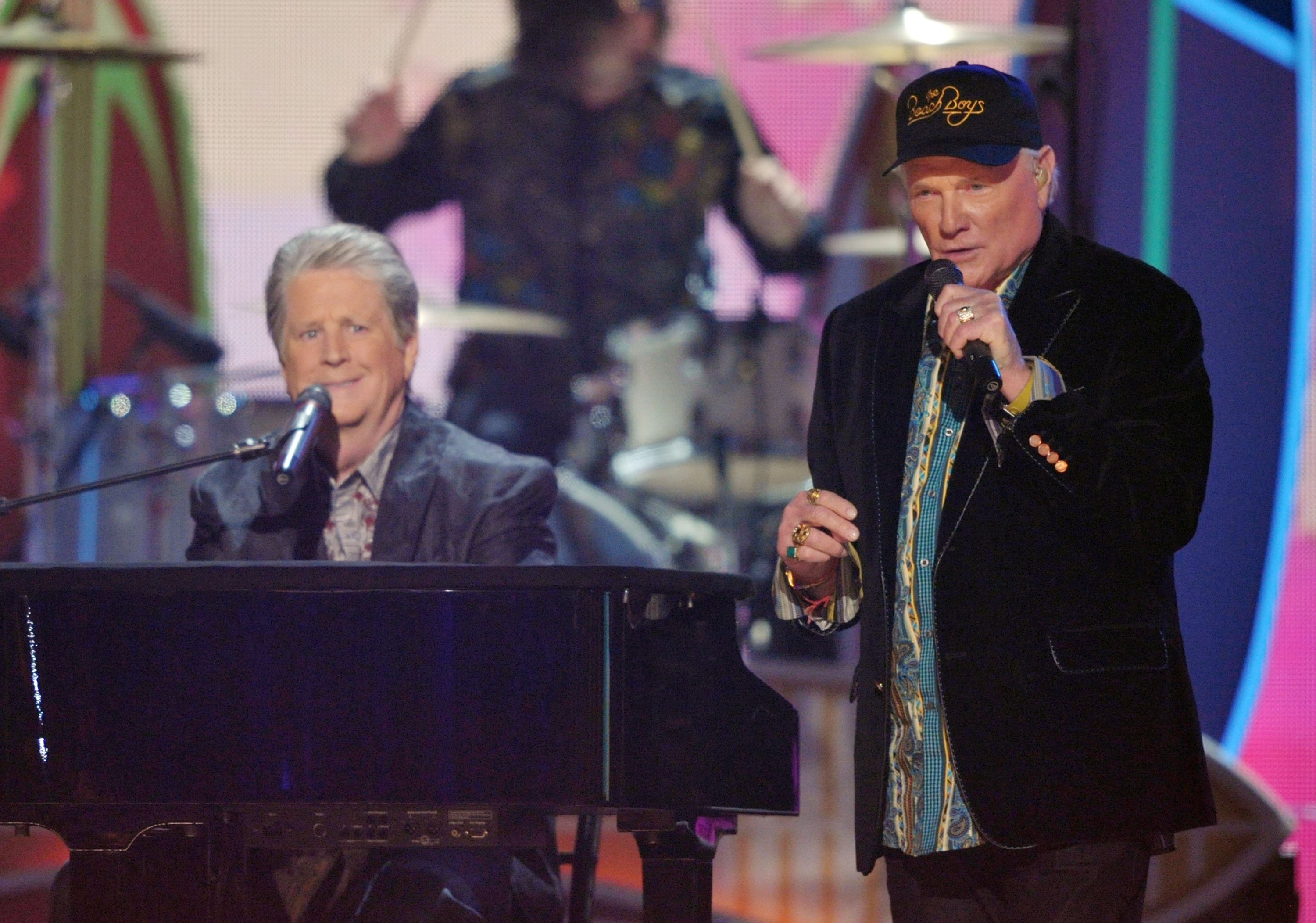 Musicians Brian Wilson and Mike Love of The Beach Boys perform at the 54th Annual GRAMMY Awards