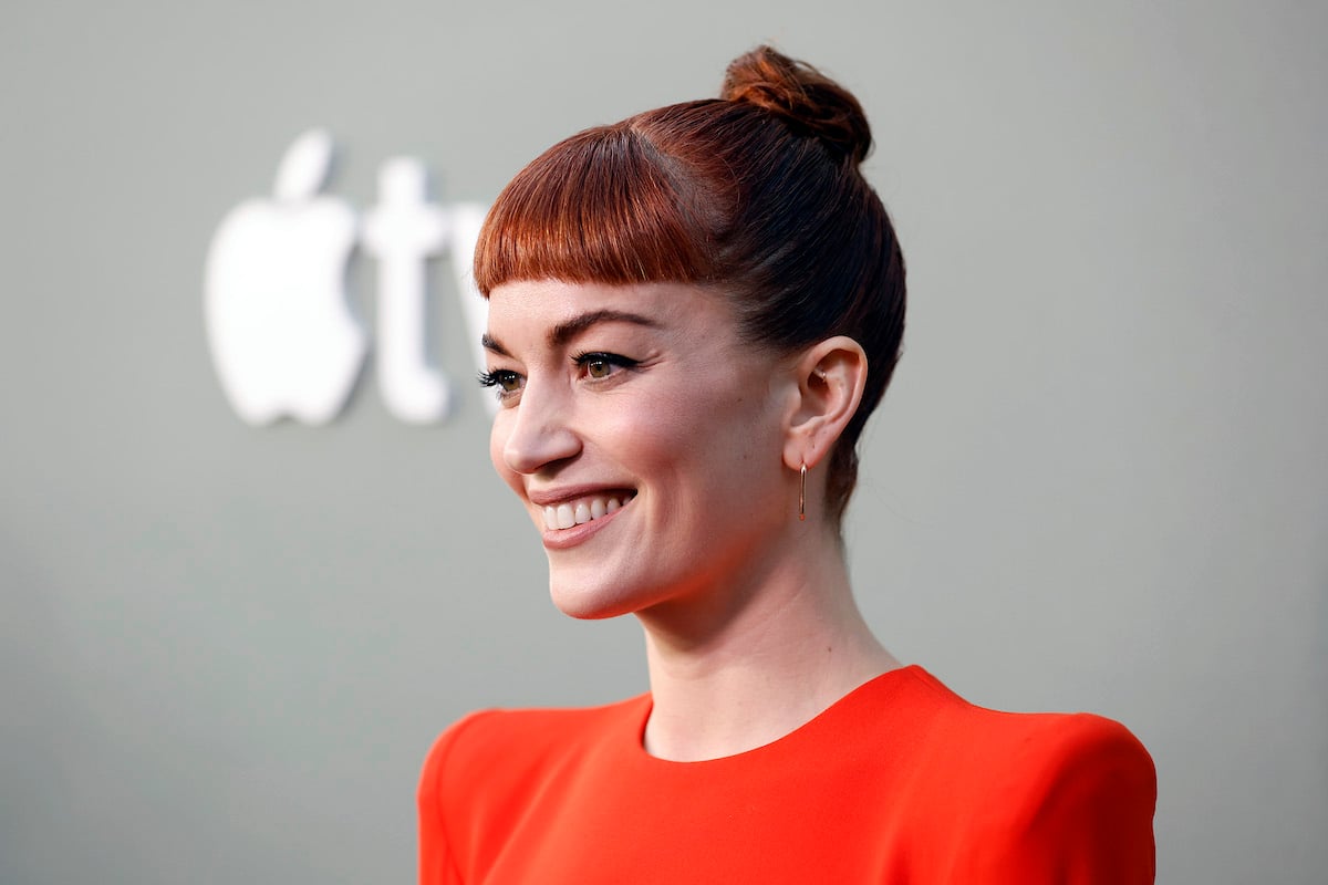 Britt Lower attends the season finale screening of Apple TV+'s "Severance" in a red dress