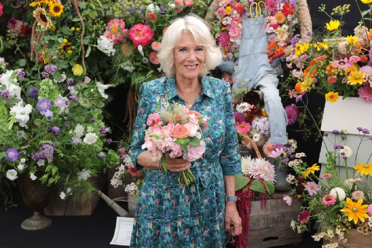 Camilla Parker Bowles smiles during a visit to The Sandringham Flower Show