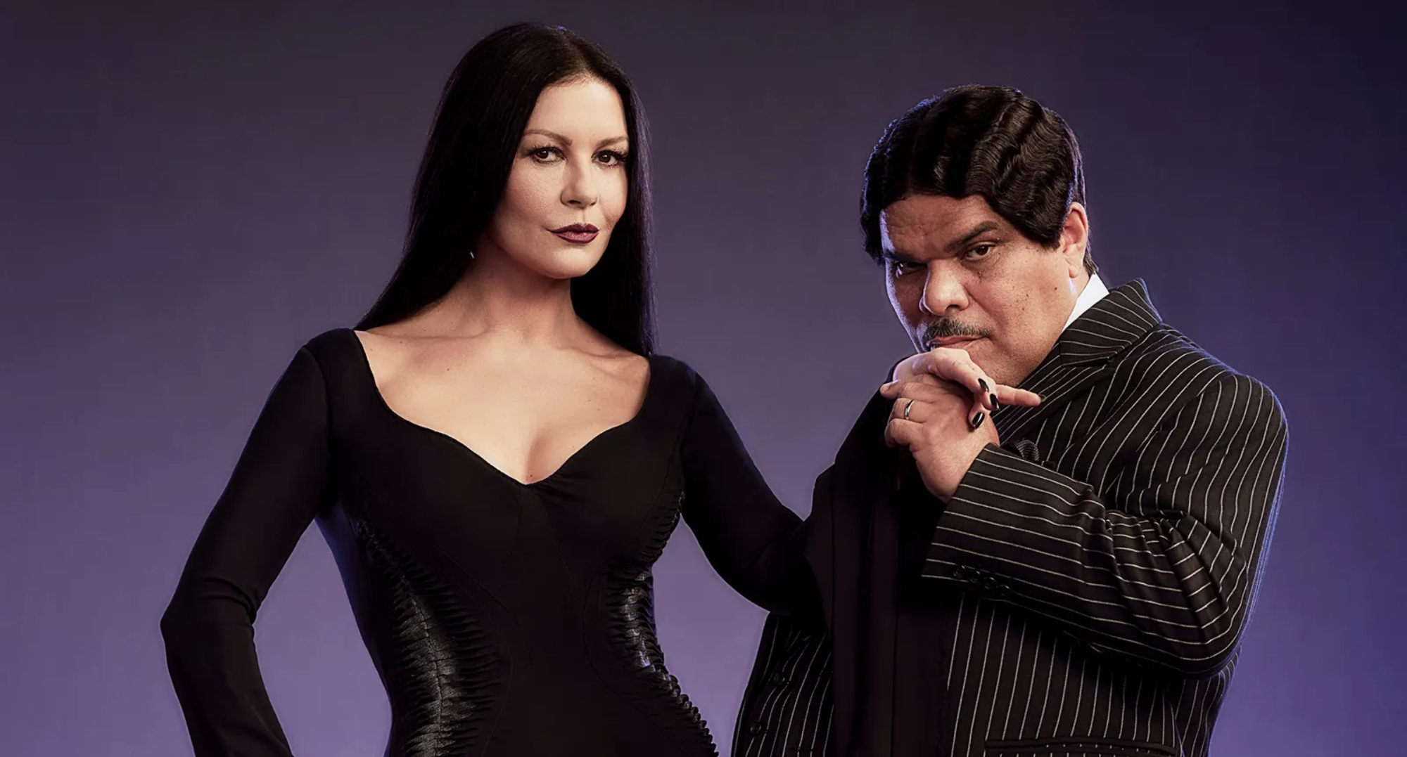 Catherine Zeta-Jones as Morticia and Luis Guzmán as Gomez Addams in 'Wednesday.