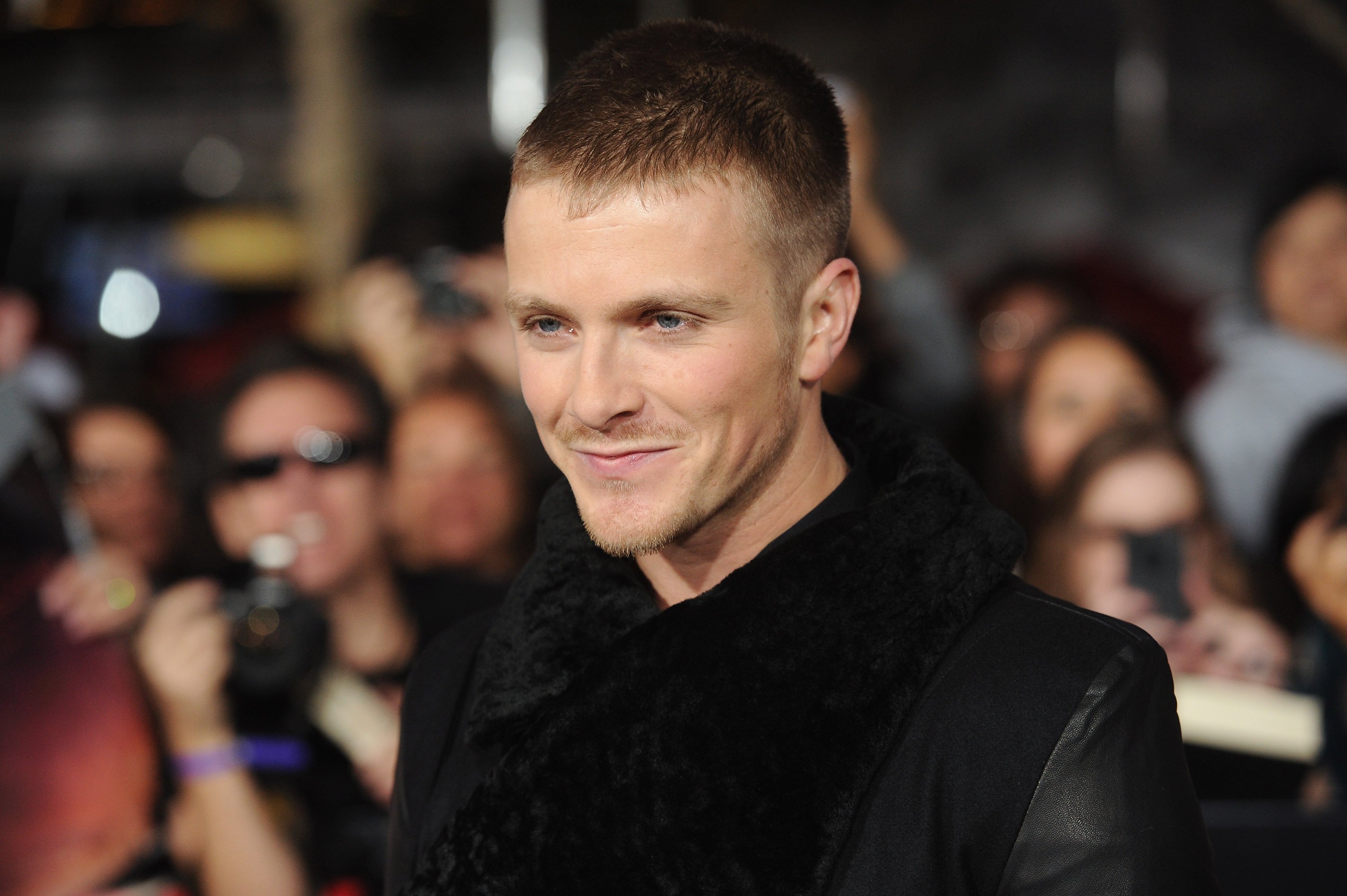 Actor Charlie Bewley, dressed in black, at movie premiere