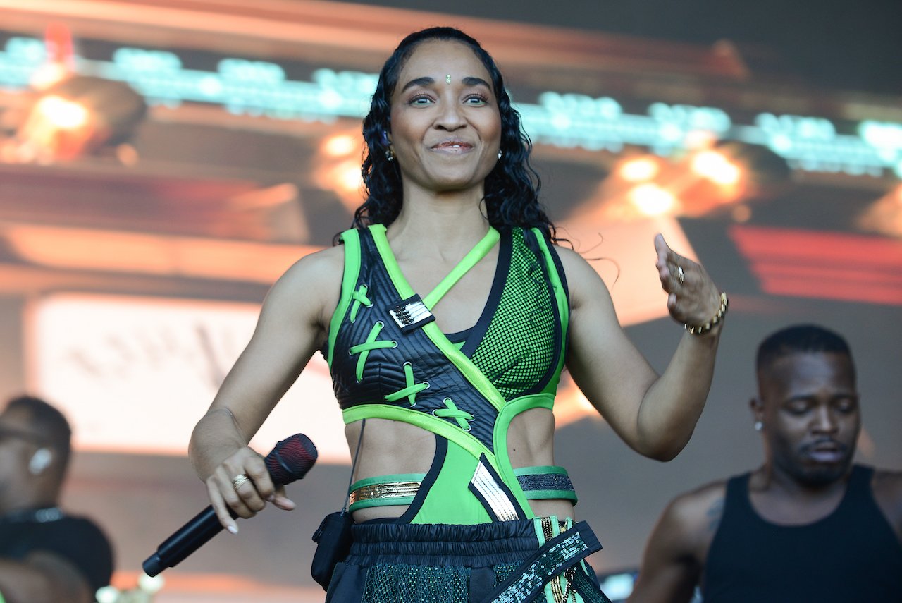 Chilli of TLC performs on stage; Chilli and Matthew Lawrence were spotted in Hawai'i